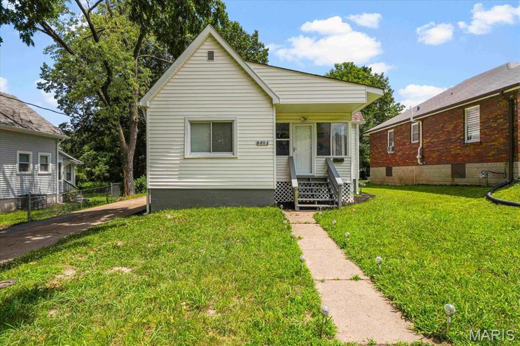 OPEN HOUSE - Sunday July 19, 1-3 - **Move right into this beautifully updated 2-bedroom, 1-bath home that combines modern finishes with classic charm! From the moment you arrive, you'll appreciate the inviting enclosed front porch—perfect for relaxing with your morning coffee or creating a cozy sitting area.
Inside, you'll find fresh paint throughout, new flooring, new windows, and new interior and exterior doors, creating a bright, clean, move-in-ready space. The completely rehabbed kitchen is sure to impress with stylish cabinetry, updated countertops, designer backsplash, gold finish sink, new refrigerator, modern fixtures, and elegant finishes. Eye-catching high-end lighting and chandeliers add a touch of sophistication throughout the home.

The fully renovated bathroom offers contemporary finishes and a fresh, modern feel. Both bedrooms are spacious with abundant natural light, and the unfinished lower level provides plenty of storage and laundry space.

Step outside to enjoy the huge backyard, offering endless possibilities for entertaining, gardening, pets, or future outdoor living spaces.

Features include:

2 Bedrooms | 1 Bathroom
Completely rehabbed kitchen
Fully renovated bathroom
New flooring throughout
Fresh paint throughout
New windows
New interior & exterior doors
High-end lighting & designer chandeliers
New refrigerator
Enclosed front porch
Large, level backyard
Move-in ready!
Don't miss this beautifully updated home offering style, comfort, and exceptional value!