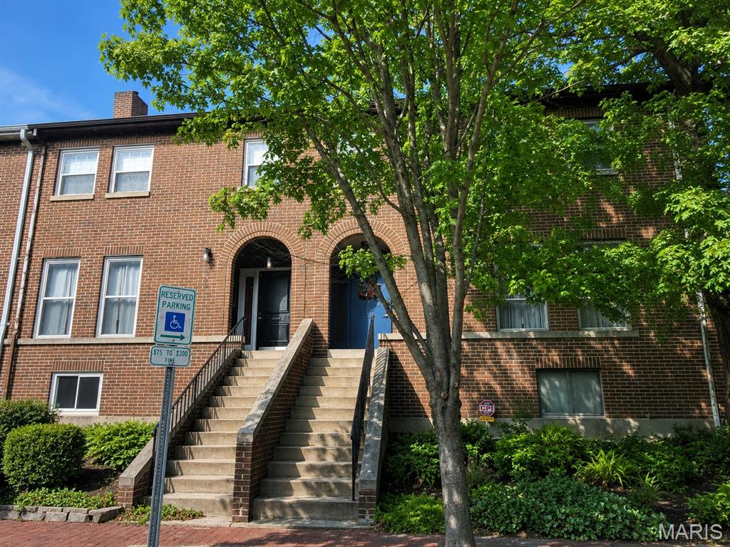This is a unique 3 bedroom, 2.5 bath townhome in Historic LaSalle Park! Tucked away on a private, cul-de-sac, within walking distance of Soulard, Ballpark Village, Busch Stadium, and Lafayette Square. This home has an open floor plan and a staircase with skylight. The kitchen has granite countertops, stainless steel appliances, abundant cabinetry, and a large breakfast bar that opens to a spacious family room. Upstairs, the oversized primary suite offers generous closet space and a private bath, and two additional bedrooms and a full bath provide plenty of room for family or guests. Dining room overlooks the private backyard with fence featuring a brick patio, storage shed, and tandem two-car parking. Property is being sold as-is. This property may qualify for Seller Financing (Vendee). If property was built prior to 1978, Lead Based Paint Potentially Exists.