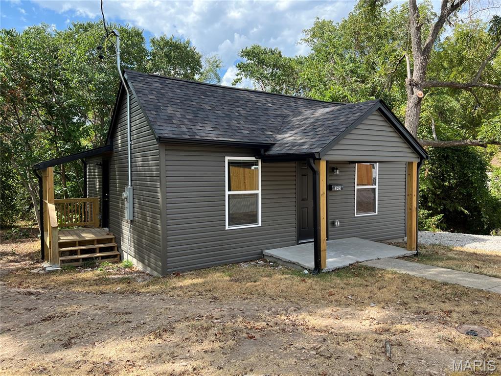 Move-in ready and completely remodeled, this charming home offers a fresh, clean look with efficiency and low-maintenance living in mind. From the updated exterior and newer finishes to the refreshed interior, this home has been thoughtfully renovated throughout. Inside, you’ll find attractive flooring, neutral colors, updated fixtures, a functional kitchen with plenty of cabinetry, and appliances already in place. The efficient floor plan makes excellent use of the space while keeping the home comfortable and easy to maintain. Outside, the updated siding, roof, covered front porch, and manageable yard add to the appeal. Whether you’re looking for an affordable first home, wanting to downsize, or searching for an investment property, this completely remodeled home is ready for its new owner. Just move in and enjoy!