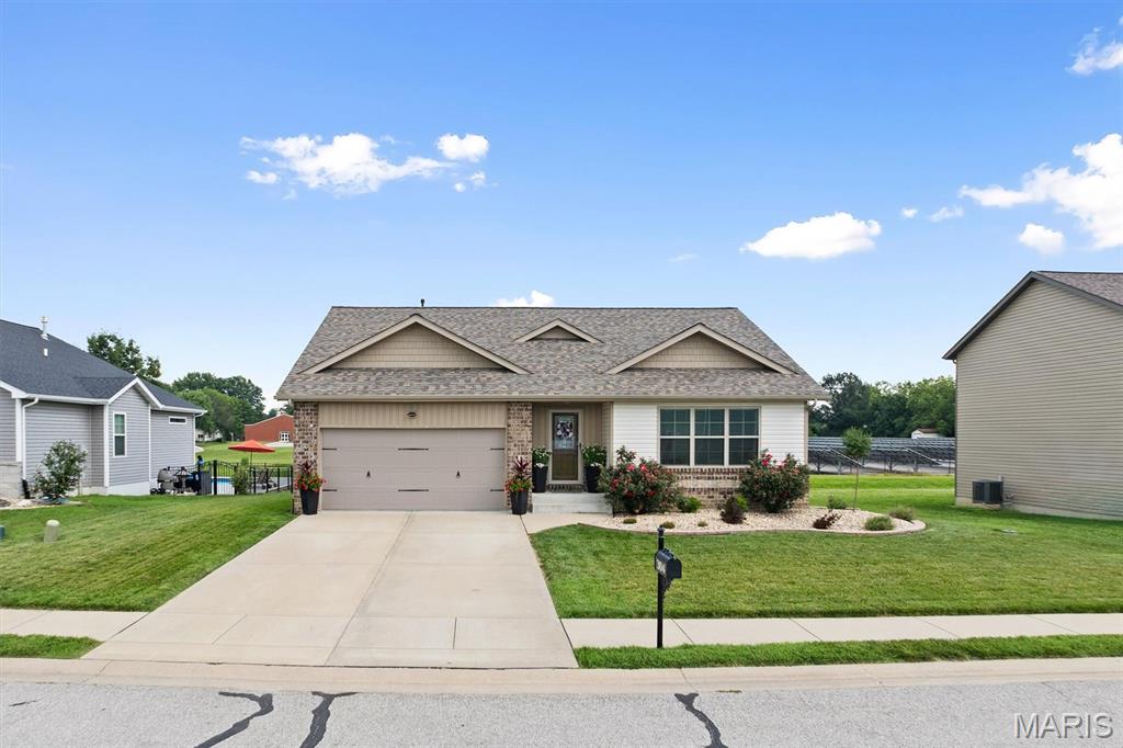 Beautiful 4-bedroom, 2 bath home with space to enjoy both inside and out! The primary suite features a walk-in closet and an en suite bathroom. The partially finished basement offers additional living space ready to become whatever fits your lifestyle. Step outside to your own backyard oasis with a pool, fully fenced yard, beautiful landscaping, and a covered patio off the kitchen thats plumbed for a gas grill. This home also has custom blinds throughout. Schedule your showing and come see for yourself!