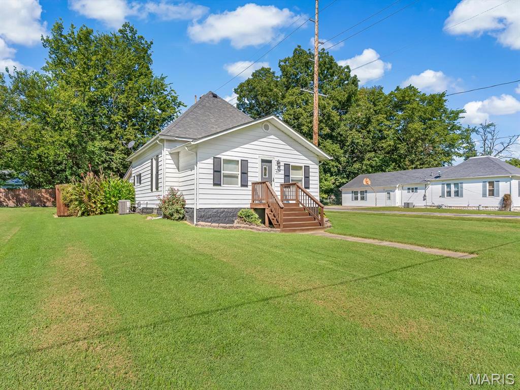 Charming 2-bedroom, 1-bath home situated on a spacious, flat corner lot! This super cute property offers 991 square feet of comfortable living space with plenty of character and curb appeal. Recent updates include a new A/C in 2025, new roof, front porch, and privacy fence in 2022, and new appliances, furnace, hot water heater, and exterior storage shed in 2017. The shed provides convenient additional storage for lawn equipment, tools, and more. Enjoy the generously sized yard and desirable corner-lot setting. A wonderful opportunity to own a charming home with numerous updates and great outdoor space! Schedule a showing today!