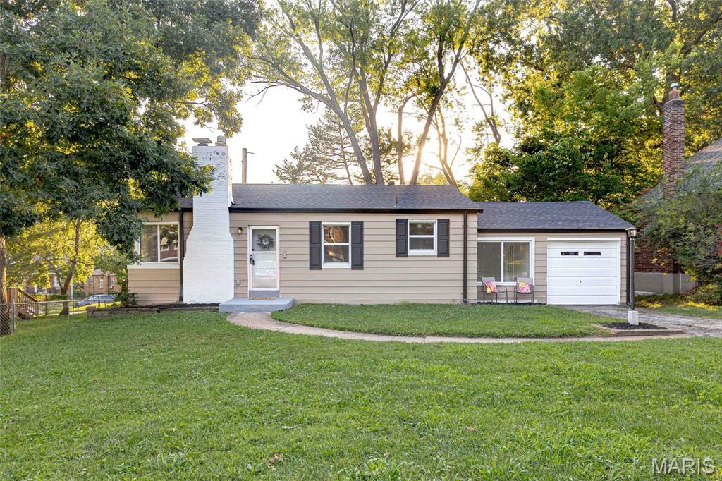 Showings start Thursday 7/23/26. Super Cute 2 bedroom 1 bath home with a 1 car garage in the Ritenour School District.  This could be a cute starter home or or your next rental property!  Light and bright and airy.  Large open concept living room/dining room with decorative fireplace and mantel and beautifully refinished hardwood floors.  Compact efficient kitchen with professionally painted cabinets, new stainless steel appliances, new faucet, new wood countertop, backsplash.  2 generous bedrooms with closets.  Hall bath has been updated with new flooring, vanity, lights, mirror, faucet.  Extra!!  Bonus room off the kitchen that could be a den, office, sleeping room...you decide.  One car garage, perfect for your vehicle and extra storage.  Clean, freshly painted full unfinished basement with w/d hookups. Nice backyard, perfect for entertaining.  New Thru-out: fresh neutral paint, newly refinished hardwood floors, LVP flooring in bathroom and kitchen, light fixtures.  New roof, soffit/fascia, shutters and gutters-2026. A/C condenser/coil-2017; Electrical panel-2017; Windows-2017; Main stack-2025. HVAC was recently serviced.  LOCATION! LOCATION! LOCATION!  Close to parks, highways, shopping, restaurants and MORE!!  This home is ready for you! Owner/Broker