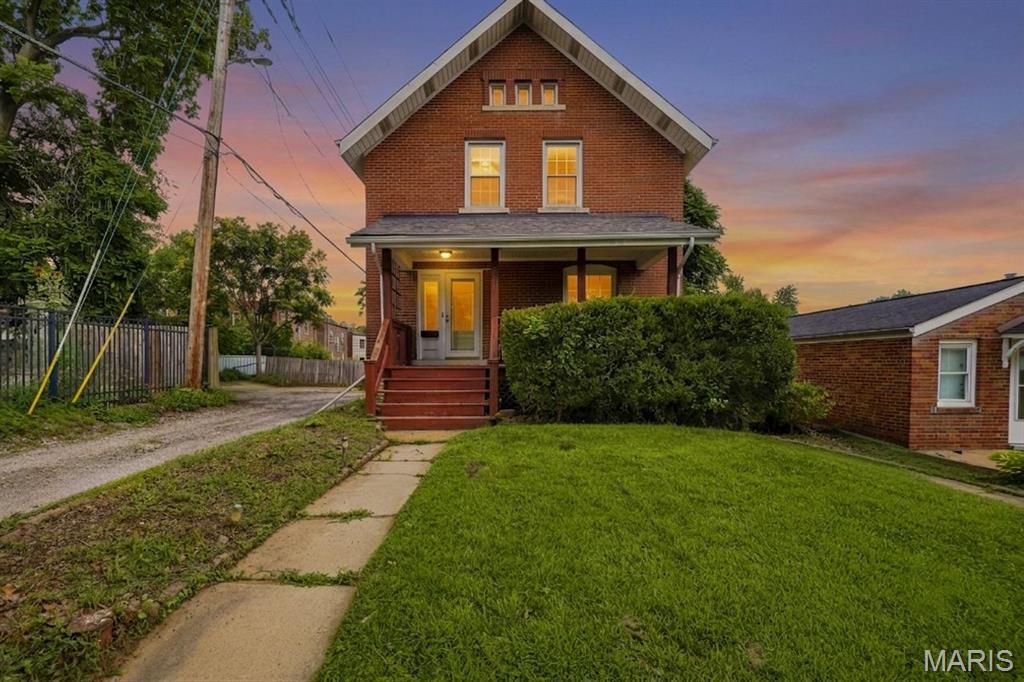 Welcome to 6941 Dale Avenue, situated in the popular and convenient Dogtown Neighborhood. Built in 1907, upon entry, you will immediately feel the historic charm. The entry way is highlighted by wood millwork and high ceilings that welcome you into a spacious family room featuring large windows and a decorative fireplace. The living area flows seamlessly into a large, formal dining room that features a large bay window. Just off the dining room is the kitchen that boasts tile flooring, stainless steel refrigerator, white cabinets and granite countertops. Head out the kitchen door to an enclosed sunroom/porch that provides access to the fenced in backyard. Upstairs, you will find three large bedrooms featuring tall ceilings, and large windows, along with a full bathroom. The property also includes a full, unfinished walk-out basement providing lots of extra storage. The backyard is fully fenced, with a pathway leading to an oversized 2 car garage complete with alley access. This home offers easy access to Forest Park, major highways, and all local amenities. The home is in need of some repairs but has already passed the city occupancy and is being sold AS-IS. A wonderful opportunity to capture some sweat equity.