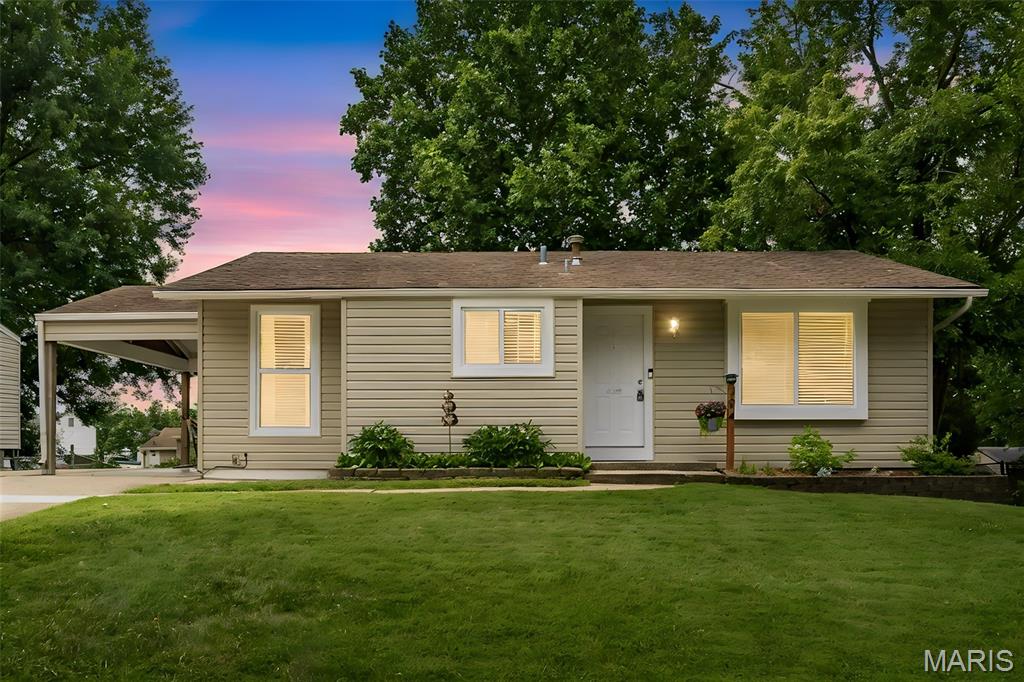 Welcome home to this charming 3-bedroom, 1-bath home offering comfort, functionality, and great outdoor living. Inside, you'll appreciate the custom stair railing that adds a unique touch of character to the home. Step outside to enjoy the spacious deck overlooking the fully fenced backyard—perfect for entertaining, pets, or play. The 10x12 storage shed provides plenty of space for lawn equipment, tools, or seasonal storage. A walkout basement offers added convenience and potential for future finishing or additional storage. Parking is a breeze with an extended driveway that accommodates up to six vehicles, plus a covered carport for added protection from the elements. This property combines practical features with plenty of space inside and out—don't miss your opportunity to make it yours!