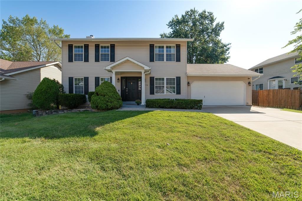 Spacious two-story home offering 4 bedrooms, 2.5 baths, and plenty of room to spread out. The main level features a formal dining room, formal living room or home office, and an open-concept kitchen and family room designed for comfortable everyday living and entertaining. The updated kitchen showcases quartz countertops, soft-close drawers and cabinets, a 10-inch deep stainless steel sink, and a touchless faucet. Upstairs, the spacious primary suite includes a walk-in closet with a custom organization system. The finished lower level provides additional living space with a family room, rec room, and dedicated office. Enjoy outdoor gatherings on the large composite deck overlooking the backyard. An oversized 2-car garage with built-in shelving offers abundant storage. Located in the highly regarded Fort Zumwalt School District with convenient access to Highways 70 and 370, this home offers the perfect blend of space, comfort, and everyday conveniently located.