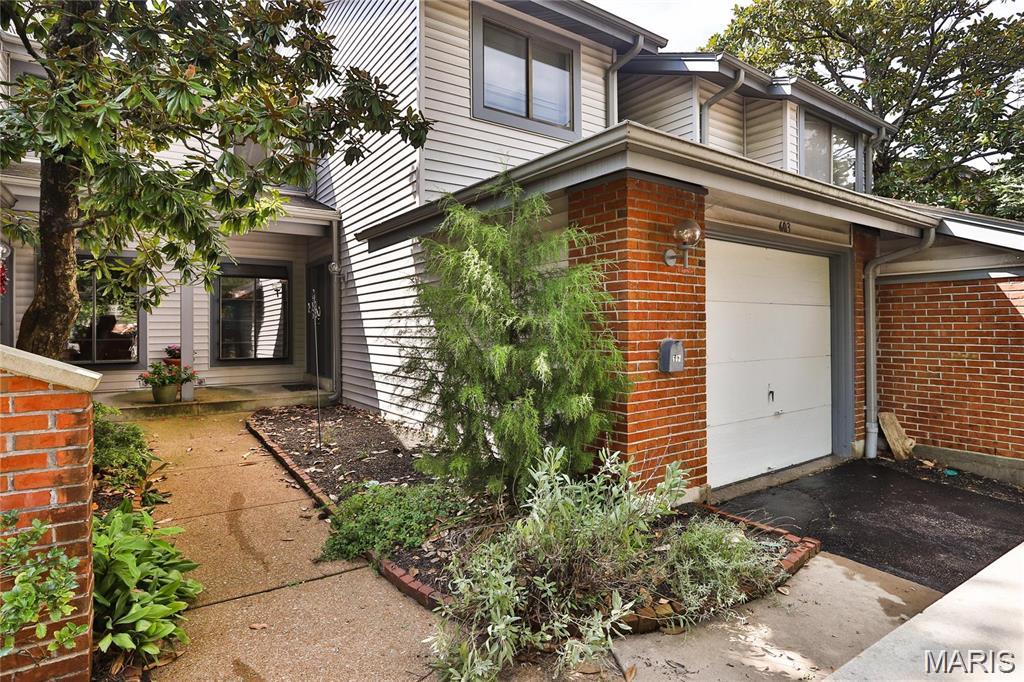 Beautifully updated 3 bedroom, 2.5 Bath condo in the highly sought after Treetop Condos in Ballwin.  Finished basement!  Walk into an open floor plan with multiple hang out spaces and lots of natural light throughout.  The living room is a great gathering space, with charming woodburning fireplace, and sliding glass door that walks out to your own private deck / outdoor space.   Head over to the large updated eat-in kitchen which has stainless steel appliances, white shaker cabinets, granite countertops, & subway tile backsplash. Right off of the kitchen is the spacious dining area, which has high ceilings & skylights above.  Head upstairs where there is a spacious primary suite, and two other large bedrooms with excellent closet space as well.  You will love the finished lower level  with a rec room, bar area, full bathroom, laundry room, & storage room.  Attached one car garage w/ private driveway.  Condo fee includes:  Pool, Clubhouse, exterior and common ground maintenance, snow removal, trash, water, sewer.    All of this, at a great location.. come see this home today!