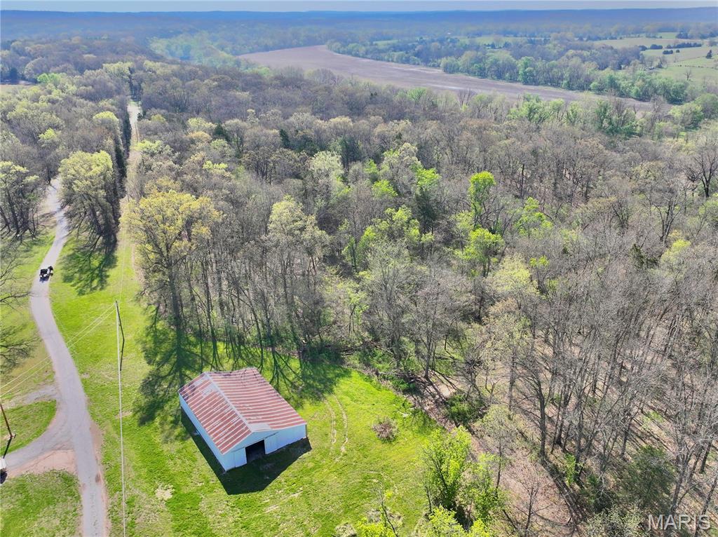 5.95± acres on the Sac River in Southwest Missouri, ideally located between Stockton Lake and Truman Lake. With 307± feet of direct river frontage, this tract offers a private stretch of water for fishing, floating, and year-round recreation.

The property includes a solid 60x40 barn with a lean-to, providing excellent space for equipment, storage, or workshop use. Electric and fiber are already on site, making this property ready for your build or weekend setup.

A prime blufftop build site overlooks the river and sits safely out of the floodplain, offering a strong location for a cabin or full-time residence. Access is convenient and secure with an electric gate, located less than 2 miles off Highway 54.

The land features a great mix of open ground and timber, creating ideal habitat for wildlife with strong deer and turkey presence.

Adjoining acreage is available on three sides, giving you flexibility to expand or customize. Whether you’re looking for a river getaway, build site, or recreational property, this one is ready to go.