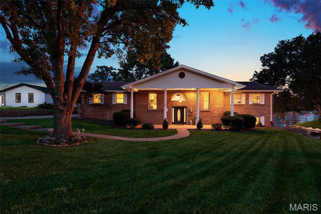 Welcome to lakefront living at its finest! This beautifully updated all-brick split foyer home is perfectly situated on the highly sought-after Holiday Shores Lake, offering breathtaking panoramic views of the main cove and over 250 feet of shoreline access.
Featuring 4 spacious bedrooms and 3 full bathrooms, this home has been completely updated from top to bottom. The stunning new kitchen serves as the heart of the home, showcasing modern finishes, ample cabinetry, and spectacular lake views that make every meal feel special.
The open and inviting layout provides plenty of space for entertaining family and friends while maximizing the incredible waterfront scenery. Step outside and enjoy everything lake life has to offer, including your private boat dock and expansive water frontage.
Additional features include a 2-car side-entry garage, updated finishes throughout, and some of the most impressive views on Holiday Shores Lake. Whether you’re enjoying your morning coffee overlooking the water or spending the day boating and fishing, this property delivers the ultimate lakefront lifestyle.
Don’t miss this rare opportunity to own a fully completed renovated waterfront home with unmatched views, exceptional shoreline access, and all the amenities you’ve been dreaming of!