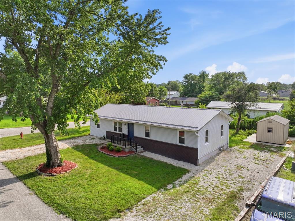 Turn-key and move-in ready! This beautifully updated 3BR, 1.5BA home offers approximately 1,300 sq. ft. on a corner lot in a quiet, established neighborhood at the end of a dead-end street. Enjoy small-town living with an ideal location between Lake of the Ozarks and Jefferson City, providing easy access to shopping, dining, recreation, and employment. Recent improvements include a rebuilt second living area with half bath, luxury vinyl plank flooring, fresh paint, updated lighting, plumbing fixtures, custom wood blinds, new kitchen cabinets, countertops, and appliances. Major upgrades include a new metal roof, HVAC, water heater, sewer line, and electrical panel for added peace of mind. The spacious backyard is a blank canvas for a garden, pool, pets, or play area. A large concrete slab is already in place for your dream garage or workshop. Every update has been thoughtfully completed, creating a stylish, low-maintenance home you'll love from the moment you arrive. Schedule your private showing today and discover everything this exceptional Eldon home has to offer! Perfect for first-time buyers, retirees, or investors seeking a turnkey property with lasting value. Ready for you!!!