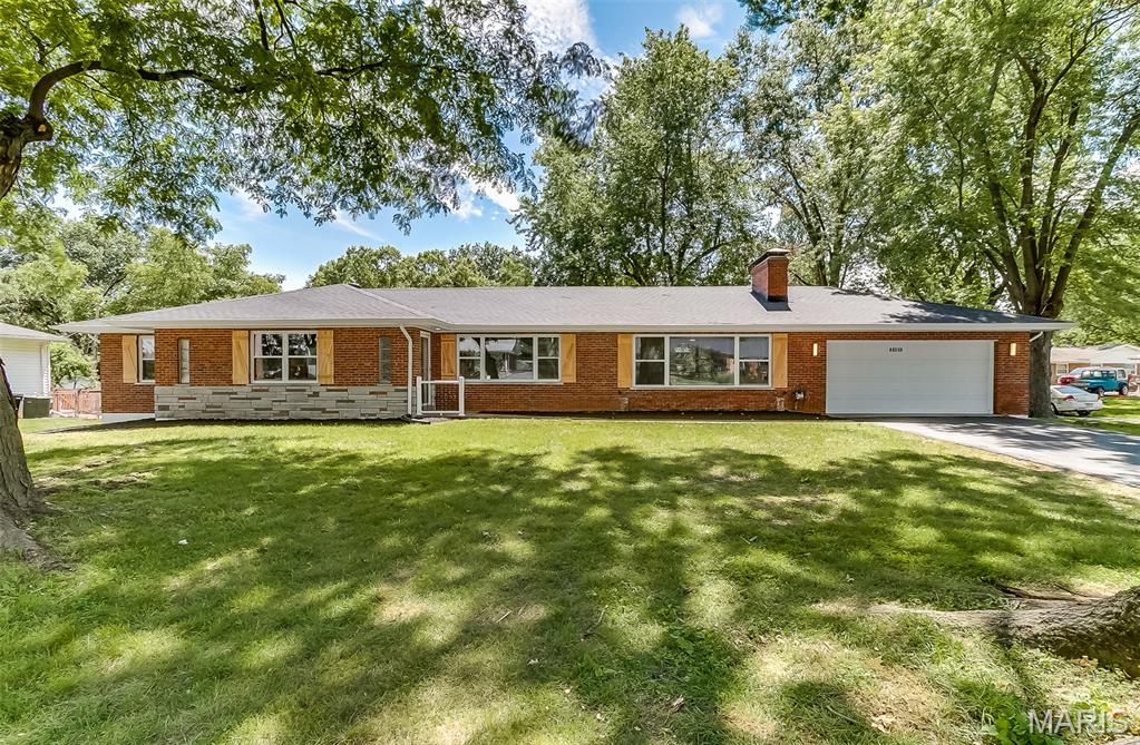 Welcome to this beautifully renovated 3-bedroom, 2-bath home offering the perfect blend of style, comfort, and exceptional value. Designed with modern living in mind, this spacious residence also features 2 additional bedrooms in the finished basement with custom entertainment center, providing flexible space for guests, a home office, recreation, or extended living arrangements. The heart of the home is the stunning updated kitchen, complete with new cabinetry, elegant granite countertops, and a full suite of stainless-steel appliances including a microwave, stove, refrigerator, and dishwasher. Throughout the home, you’ll find refined finishes such as laminate wood flooring, ceramic tile in the kitchen and bathrooms, updated vanities and tub, and beautifully finished tub and shower surrounds. Recent improvements include new thermal windows, new exterior, storm, and interior doors, fresh interior and exterior paint, updated lighting with ceiling fans and recessed can lights, new plugs and switches, and major system upgrades including an architectural shingle roof, outside sewer drain, PVC stacks, water supply lines, faucets, central air conditioning, furnace, and a 40-gallon hot water tank. The exterior is equally impressive with fresh landscaping and a new sealed driveway, adding to the home’s curb appeal and move-in-ready convenience. This is an outstanding opportunity to own a thoughtfully upgraded home with generous living space and quality updates throughout.