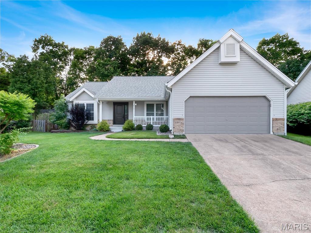 Spacious 3-bedroom, 3-bath ranch featuring an open layout with vaulted ceilings and skylights that brighten the dining and living areas. The great room includes a cozy fireplace framed by large windows for plenty of natural light. The kitchen and breakfast area offer a charming bay window and sliding glass doors leading to an expansive patio and fenced backyard with a wooded backdrop for added privacy. The primary suite on the main level features a vaulted ceiling, walk-in closet, and bay window. Its updated ensuite bath includes a newer vanity with digital temperature faucet, shower, and flooring. Two more bedrooms and an updated full hall bath complete the main floor, along with a convenient laundry room located just off the kitchen. The finished lower level provides exceptional additional living and entertaining space, including a massive 26x22 family room with carpeting, home theatre system with surround sound, a recreation area, and bar area. This level also includes a third full bathroom, a private office or sleeping area, and generous storage space. Additional amenities include voice controlled interior lighting (an Alexa device is needed), tankless water heater, exterior lights from Bloom lighting that offers several colors and features as well as HUE lighting, nest AC unit with entry & exit detection for lower electric bills! Residents of the subdivision enjoy amenities such as an in-ground pool, lake access, tennis and pickleball courts, plus a clubhouse with a fitness center.