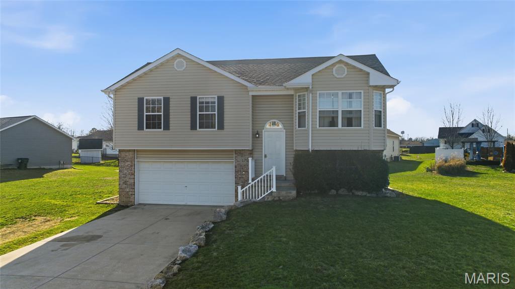 Enjoy the perfect blend of comfort and outdoor living in this 3-bedroom, 2-bath home located in the Estates of Jonesburg. Complete with new solar panels, a finished rec room, and a stunning 48’ stamped concrete patio with fire pit, this is a must see. Inside, you'll find a functional layout with inviting living spaces including a large open concept kitchen and living room, complete with vaulted ceilings, wood flooring and tons of natural light. The three bedrooms offer comfortable space and brand-new carpeting, creating cozy retreats that feel fresh, clean, and ready for you to make your own.
Downstairs, you will find a finished recreational room providing ample space for a second living area, game room/play room, or large home office. The home also features a spacious two-car garage, providing plenty of storage and convenience.
Step outside and enjoy the property’s large lot, ideal for relaxing or entertaining. A beautiful maintenance free deck just off the kitchen creates the perfect spot for morning coffee or evening meals, while the impressive 12’ x 48’ stamped concrete patio with a built-in fire pit offers a standout outdoor gathering space for hosting friends and family year-round.
A major bonus to this property is the newly installed solar panel system, providing energy efficiency, savings on monthly electric bills, and a forward-thinking upgrade for today’s homeowners adding long-term value. In addition, a new roof was installed in 2024.
Located in a great neighborhood with close to the elementary school, this home combines comfort, outdoor living, and convenience in one attractive package. This one checks all the boxes!
