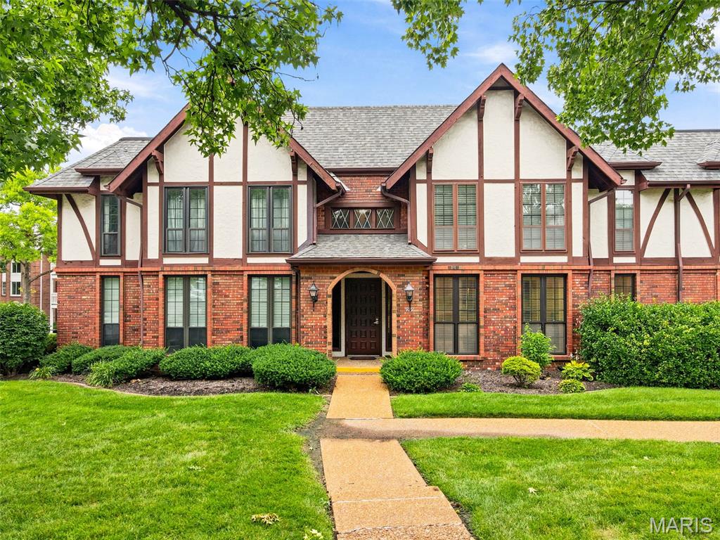 Stunning main-level living awaits in this beautifully remodeled Claytonbrook condominium. No detail was spared, featuring premium Andersen windows, custom trim, recessed lighting, and gorgeous hardwood floors. The gourmet kitchen is a chef's dream with custom cabinets, granite countertops, stainless appliances, custom tile backsplash, and  pantry. Enjoy two spacious bedrooms, each boasting its own walk-in closet. The spacious primary suite is a relaxing escape featuring a primary lux bath with custom lighting, timeless tile work, an expanded double vanity, and walk in closet. The second full bath has been beautifully remodeled and features ceramic tile flooring, solid-surface vanity, and custom tile. Complete with an enormous basement storage space, a large laundry room with a wash tub, and a convenient two-car tuck-under garage, this high-end home blends style with ultimate functionality.