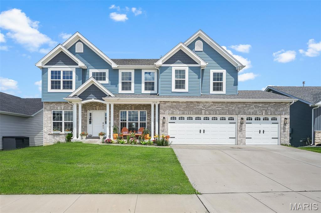 Welcome to luxury lake living at its finest just blocks away from the highly sought-after New Town community, and right across the street from Orchard Farm High School. Thoughtfully custom built in 2023 with intentional design, elevated finishes, and functionality throughout, this one-of-a-kind home offers a rare blend of luxury, comfort, and versatility.

From the moment you enter, you’ll notice the difference! Soaring 10-foot ceilings on BOTH levels, oversized 8-foot custom doors, stunning natural light, and carefully curated finishes that create an upscale yet inviting atmosphere. Designed for both everyday living and entertaining, the home features two separate living spaces, a breathtaking 7-foot marble island, a full butler’s pantry, and custom details throughout every inch of the home.

The primary suite was intentionally designed to capture the beauty of the morning sunrise, with custom window placement allowing you to relax in the bathtub while overlooking peaceful natural light and lake views.. a truly unmatched experience.

Downstairs, the fully finished basement offers walk-out access, a full bathroom, bedroom, and bonus room and an entirely separate living opportunity complete with a second kitchen, expansive living area, and private functionality perfect for:
• Multi-generational living
• Guest quarters
• Private suite setup
• Potential short-term rental or income-producing opportunity

Additional premium features include:
• Built-in central 1500 sqft vacuum system on both levels
• Dual climate HVAC system
• Tank-less water heater
• Automatic blinds
• Oversized 3-car garage with additional workspace/storage area
• Backyard that comes up to common ground and lake
• High-end custom craftsmanship throughout

This is more than just a home.. it’s a lifestyle property built with intention, functionality, and luxury in mind. Opportunities like this within this newest expansion of the Charlestown Landing are exceptionally rare.