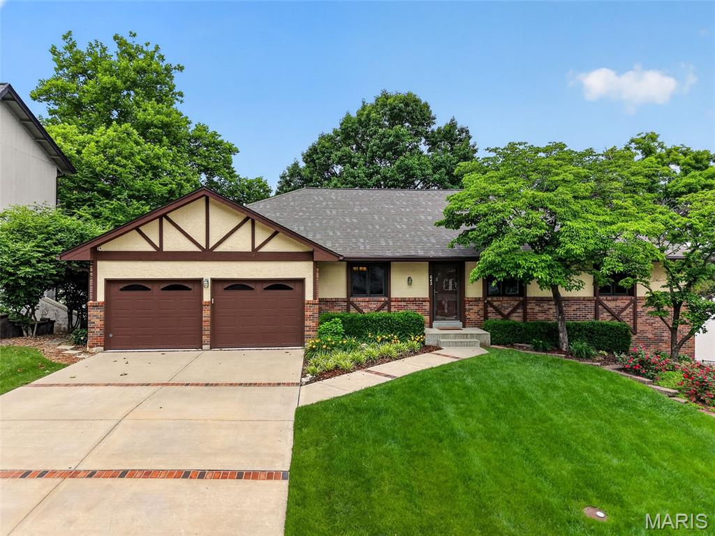Experience lakefront luxury at its finest in this stunning 4-bedroom, 3.5-bath ranch perfectly positioned on the shores of Lake St. Louis. With breathtaking water views, a private dock just steps away, and resort-style community amenities, this is more than a home—it’s a lifestyle designed for those who want every day to feel like a getaway.
From the moment you step inside, walls of windows draw your eye to the sparkling lake beyond. Hardwood flooring flows through much of the main level, while the inviting living room offers a cozy gas fireplace flanked by windows showcasing panoramic water views. A glass slider opens to the expansive screened porch, creating the perfect place to enjoy morning coffee, sunset dinners, or simply unwind while overlooking the water. Convenient exterior access and stairs leading directly down to the dock make lake living effortless.
The beautifully updated kitchen is truly the heart of the home, featuring Quartz countertops, stainless steel appliances, under-cabinet lighting, tile backsplash, and soft-close cabinetry. The adjoining breakfast room is wrapped in windows, allowing spectacular lake views to become part of everyday living. A formal dining room with tray ceiling adds elegance for entertaining.
Wake each morning to serene waterfront views in the luxurious primary suite, complete with a wall of windows, crown molding, and an impressive walk-in closet with custom organizer system. The spa-inspired bath features a seated tile shower with dual shower heads. Two additional bedrooms and a beautifully updated hall bath with dual sinks and tile shower complete the main level, along with a laundry room and powder room.

The finished lower level was designed for entertaining and relaxed lake living. Gather around the wood burning fireplace in the family room or host unforgettable evenings in the expansive rec room featuring a wet bar with beverage/wine fridge, full-size refrigerator, and sink. A fourth bedroom and stunning full bath with tiled shower provide ideal guest accommodations. The unique three-way access to the lower-level bath allows direct entry from the rec room, bedroom, or outside patio—perfect for rinsing off after a day on the lake before heading indoors. A versatile bonus room behind rolling doors offers endless possibilities for a home office, fitness studio, media room, or game space.
Outside, the 2nd oversized tuck-under garage provides exceptional storage for lake toys, golf cart, or workshop space. Just a few steps away, your private dock invites endless days of boating, fishing, kayaking, and sunset cruises. Life in Lake St. Louis is truly unmatched. Residents enjoy an incredible resort-style community featuring an 18,000-square-foot clubhouse with restaurant, bar, live music, ballroom, and lakeside dining patio, along with golf, tennis, pickleball, beaches, pools, fitness center, ski clubs, fishing, kayaking, social events, and year-round activities. Whether you’re relaxing on the water, entertaining friends, or enjoying the vibrant community atmosphere, this extraordinary property offers the ultimate luxury lake lifestyle. True lakefront opportunities on Lake St. Louis rarely become available, making this exceptional property an opportunity not to be missed.