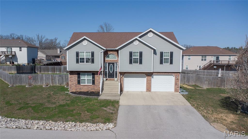 Back on the market at no fault of the sellers or the home. Welcome to this well maintained 4 bedroom, 3 bathroom home located in the desirable Taylor Hills subdivision. Designed with comfort and functionality in mind, the home features a spacious open floor plan that seamlessly connects the living, dining, and kitchen areas, creating an ideal space for both everyday living and entertaining.

The generously sized bedrooms provide plenty of space for family, guests, or a home office, while the three full bathrooms offer convenience and flexibility. The primary suite offers a relaxing retreat with a private bathroom featuring both a jetted soaking tub and a separate shower, perfect for unwinding at the end of the day.

Step outside to enjoy a large, flat fenced backyard that is ideal for outdoor gatherings, pets, play, or simply relaxing in your own private space. The backyard also includes a playset and trampoline that will convey with the purchase, offering additional outdoor enjoyment from day one. Pride of ownership shows throughout with the home's excellent upkeep and thoughtful care. With its inviting layout and well maintained condition, this Taylor Hills home is ready to welcome its next owners.