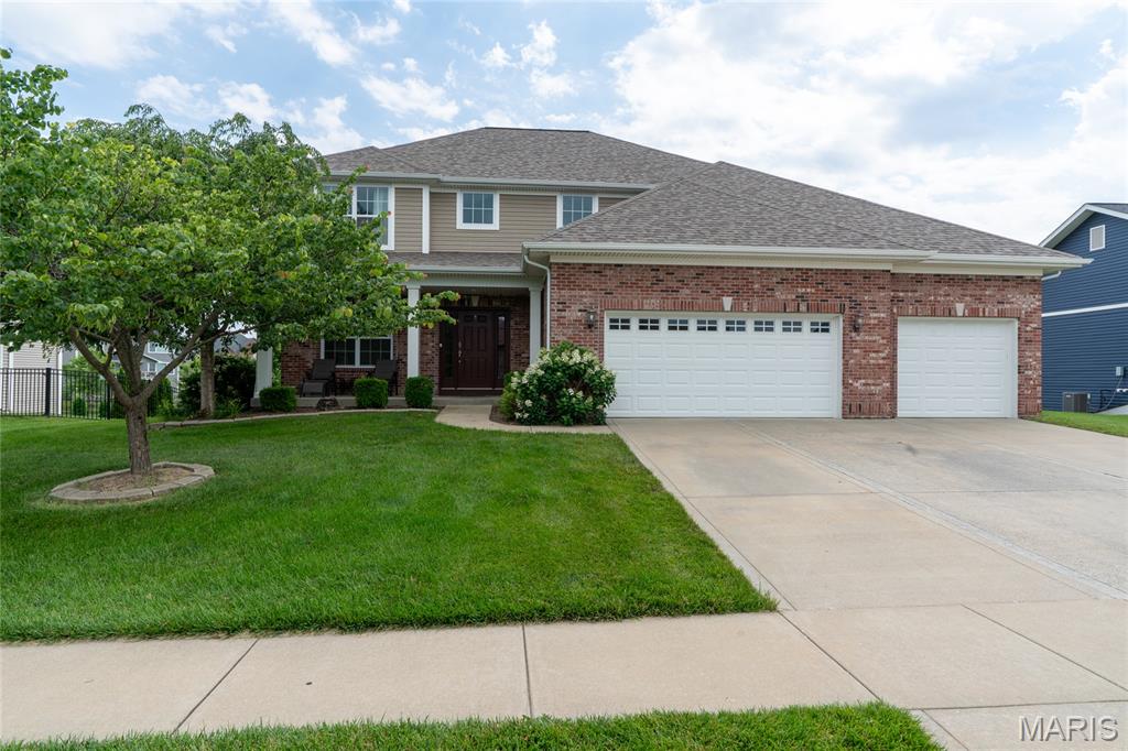 The Home features a Walk-Out Basement, 3-car garage and sits on a level, fully fenced 0.5-acre lot. The property is upgraded with highly functional network of utilities and dedicated entertainment spaces. Equipped with dual water heaters and an integrated whole-house vacuum system. Features solid surface countertops, tall cabinetry, and stainless steel appliances. Includes double walk-in closets, a deep soaker tub, and a double vanity. Dedicated laundry room on the upper level near the bedrooms.  Elevated outdoor living space overlooking the lake. Outdoor Utilities: Features built-in outdoor speakers and a dedicated gas line hookup for a grill. Basement Media Room: Includes integrated surround sound speakers and plumbing for a future wet bar.