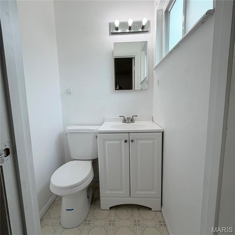 Welcome to this well-maintained 3-bedroom, 1.5-bath home featuring a spacious layout and a partially finished basement with plenty of potential for additional living space, an office, or hobbies. Recent improvements include brand-new windows throughout, a new patio door, and brand-new carpet. The home has also passed its occupancy inspection, providing added peace of mind for the next owner. Conveniently located near Lilac and HWY 270, this property presents a great opportunity for homeowners or investors. home is being sold as-is.