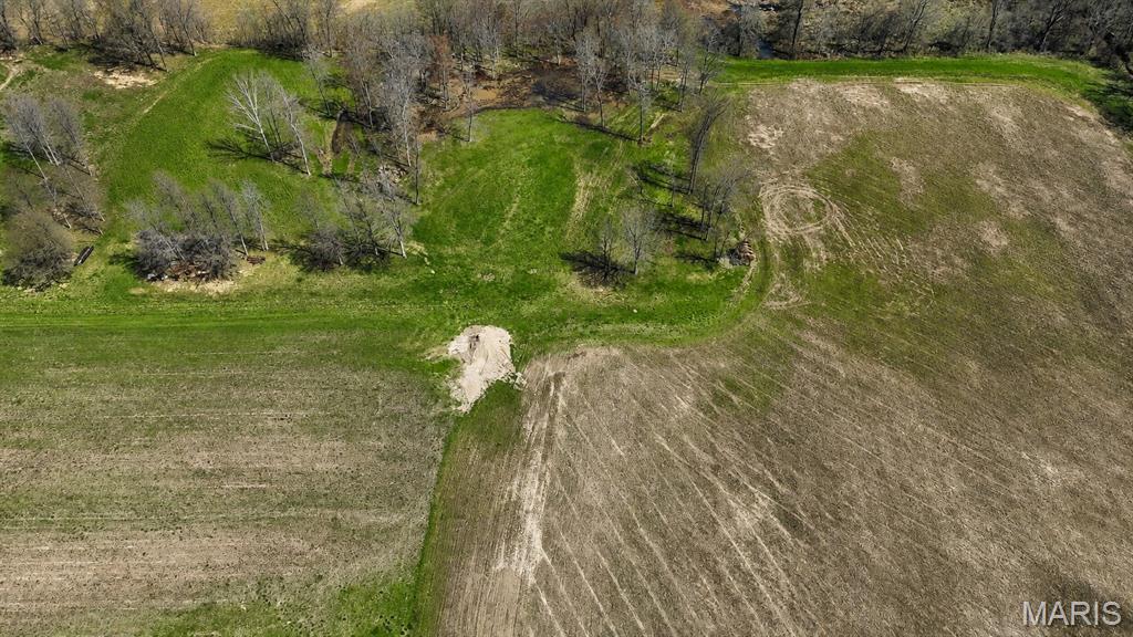A rare opportunity to own approximately 20 acres of privately managed wetland habitat near Mingo National Wildlife Refuge and Duck Creek Conservation Area—an area widely recognized for waterfowl and outdoor recreation.

Designed with waterfowl management in mind, the property features an irrigation system and a water-control structure incorporated into the levee system, allowing water levels to be managed more efficiently. The tract offers potential for waterfowl hunting, wildlife habitat, recreation and seasonal enjoyment in the heart of Southeast Missouri’s celebrated waterfowl country.

Whether you are looking to expand your hunting ground, establish a private recreational retreat or secure land near two major conservation areas, this property offers a unique opportunity. The adjoining custom home, approximately 5 acres and 3,000+ square-foot shop are also available separately, creating the option to purchase the entire property. 
Home, shop and approximately 5 acres: MLS #24017795.
Home, shop and entire approximately 25-acre property: MLS #24019337.