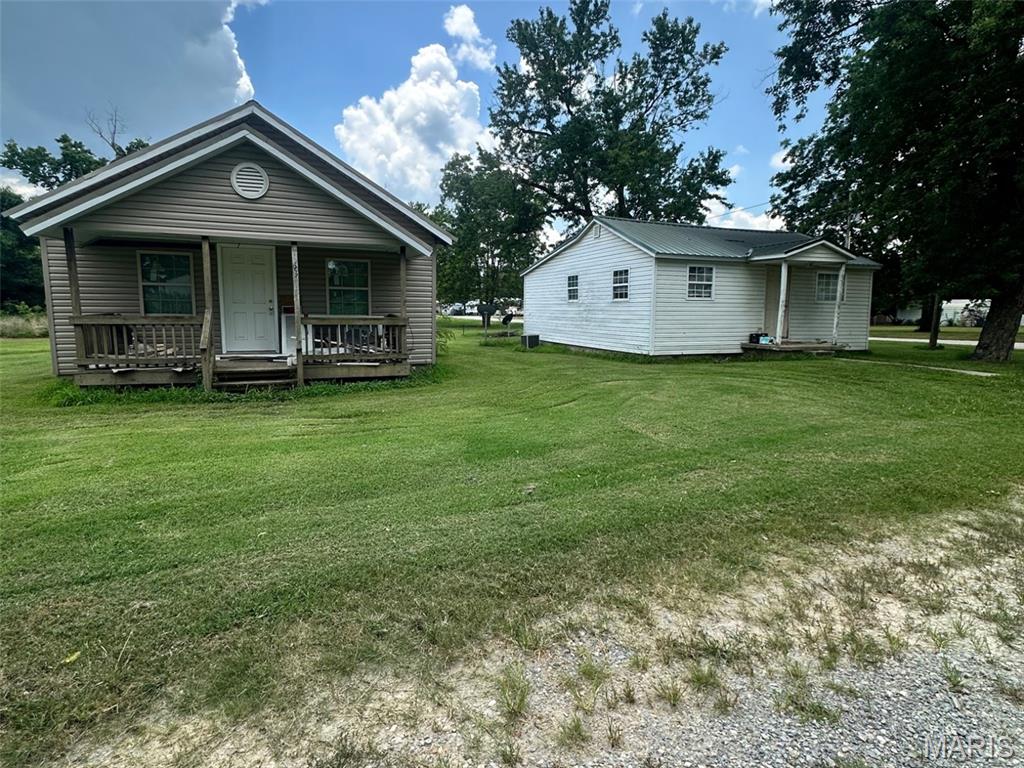 Fantastic investment opportunity with two homes on one lot! Both homes have a 2 bedroom 1 bathroom layout. The front home has already received major exterior improvements, including new siding and new windows, but the interior sustained fire damage. Finish it to your own style and add significant value. The second home has already undergone several updates and is close to being rent-ready, needing only a few minor finishing touches. Whether you're looking to build equity, create rental income, or renovate and resell, this property offers excellent potential. Don't miss this unique opportunity to own two homes on one lot with multiple investment possibilities!