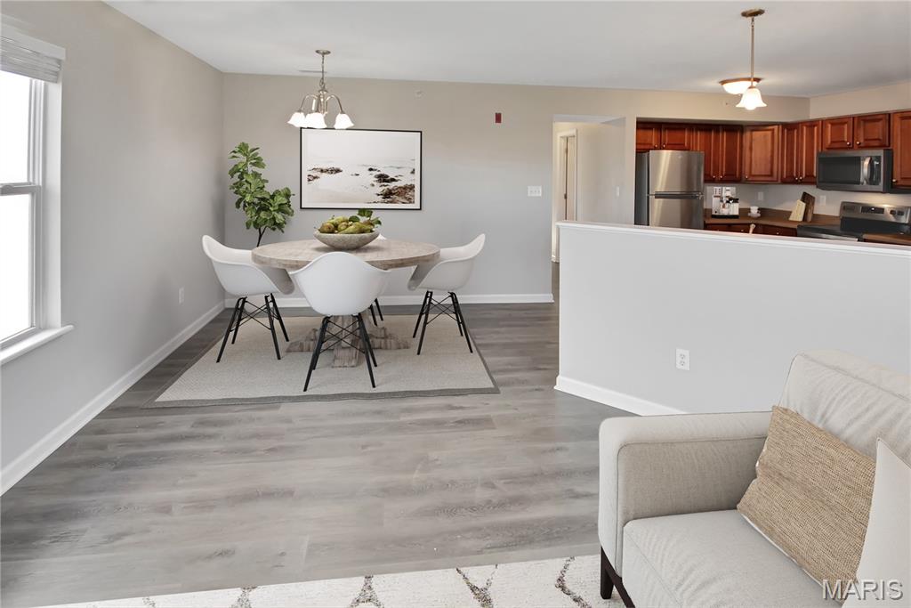 Beautiful 2 bed/2 bath first floor Georgetown Park condo with 1 car over-sized garage and large storage space. The open floor plan features a living/dining combo. Full kitchen with breakfast bar and refrigerator, dishwasher, electric range, microwave, and pantry. The primary bedroom includes a full bath, walk-in closet, and sliding glass door to a private balcony. The laundry room comes with washer & dryer. Includes a large storage room (10'x15') and over-sized (21'x11') 1 car private garage with opener in basement. This home is pet-friendly with a $200 pet fee and $30/month rent per pet and features a community dog park. Tenant responsible for electric, water, and sewer. Security deposit equal to one month's rent.