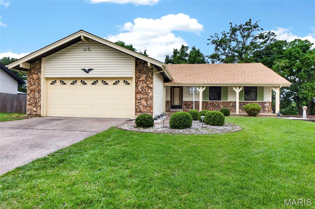 Bursting with opportunity and potential is 117 Montana Dr. This well maintained 3 bedroom, 3 bath home features a separate bedroom floor plan and a main floor laundry room. As you step inside, the long foyer leads to the great room with a vaulted ceiling, gas fireplace as the focal point, and it flows right into the kitchen to easily accommodate gatherings or every day living. The kitchen offers seating at the center island, gas range, plenty of counter space, a large pantry and a bay window that overlooks the backyard. The primary suite is spacious and offers a walk-in closet and full bath while the secondary bedrooms share a full bath. The walk out lower level is mostly finished with a nicely sized full bath, storage/ utility area with a work bench and shelving. Some of the recent upgrades are a new roof, new sliding glass door in the lower level, HVAC has been serviced & new toilet in the shared bathroom. The deck was upgraded last year with composite decking, rod iron spindles, and vinyl handrail. Located close to anything you could possibly need on Mid Rivers Mall Dr, schools, parks and more.