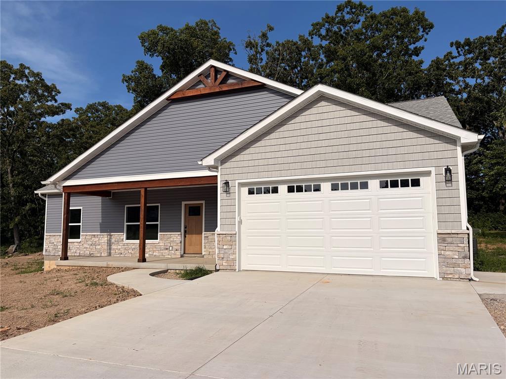 Great Opportunity for a Brand-New Custom Home!
Nestled in a peaceful and highly sought-after neighborhood in the charming town of Sullivan, this beautifully designed new construction home offers the perfect blend of comfort, style, and functionality. Featuring 3 bedrooms and 2 bathrooms, the home boasts a spacious open-concept floor plan, vaulted ceilings, and generously sized bedrooms.
The impressive master suite includes a walk-in closet, while the kitchen showcases granite countertops and stainless steel appliances. Enjoy your morning coffee on the inviting front porch or unwind on the private back patio. A convenient two-car garage provides plenty of room for parking and storage. With quality finishes, thoughtful design, and modern amenities throughout, this custom home is an opportunity you won't want to miss. Schedule your showing today!