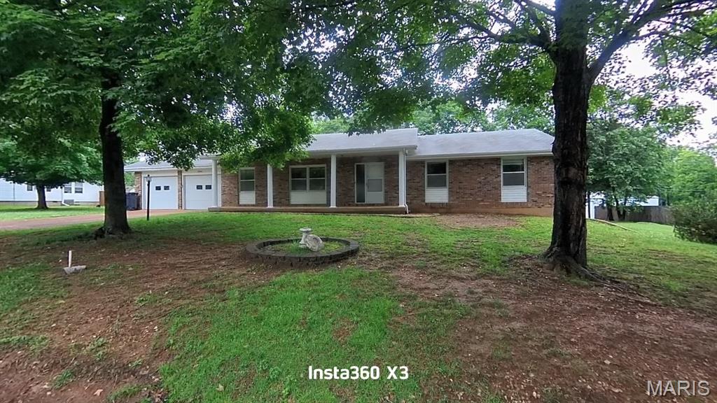 Ranch-style home on a quiet street. Front covered porch. Large kitchen with a new built-in oven. Updated Laminate flooring and Carpeting in the bedrooms. Professionally cleaned. Full Walkout basement with a finished family room. 2-car garage. Storage Shed. Has a nice level yard. Mature trees.