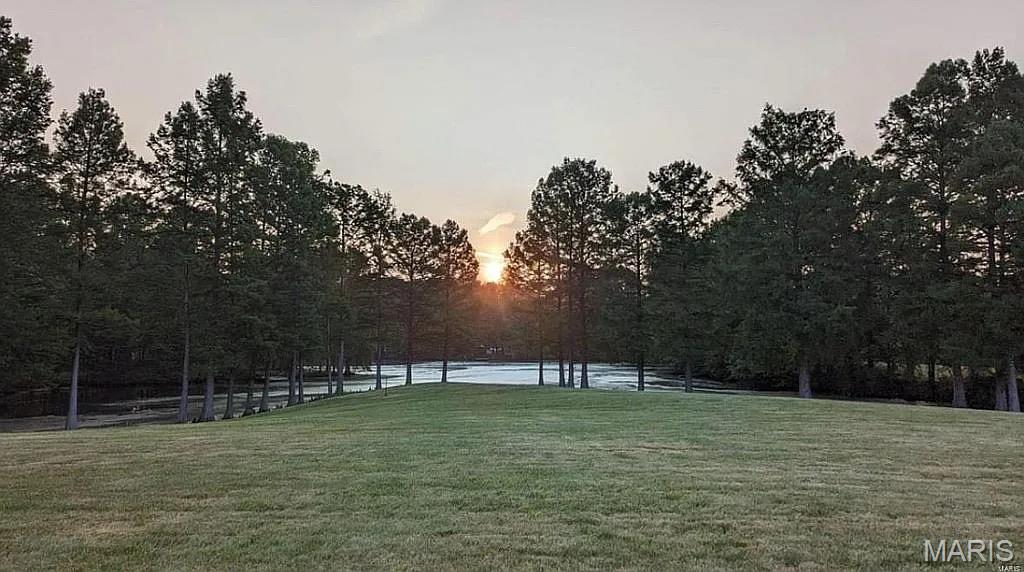 Build your dream home on this beautiful 2.4-acre lot featuring stunning lake views! Imagine starting your day with a peaceful cup of coffee on the back deck of a home designed entirely to your vision. With plenty of space and endless possibilities, this property offers the perfect setting for a custom build tailored to your lifestyle.
Minimum building requirements include a ranch-style home with an attached garage at no less than 1,500 square feet, a ranch with a detached garage at a minimum of 1,700 square feet, or a two-story home with at least 1,800 square feet (including 900 square feet on the main level).
Enjoy the best of both worlds—serene, scenic surroundings with convenient access, located just 3 miles from I-255 for an easy commute.
Don’t miss this opportunity to create the home you’ve always imagined in a peaceful, picturesque setting!