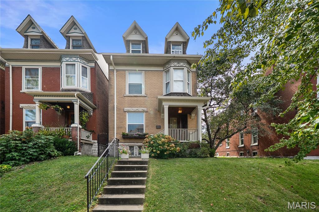 Welcome home to 3924 Cleveland Ave, a beautifully maintained historic residence nestled in the heart of the Shaw neighborhood! Blending timeless historic charm with modern functionality, this property offers generous living spaces filled with natural light. The thoughtful floor plan features ample bedrooms, perfect for both effortless everyday living and entertaining. Retreat to the third floor, offering a dedicated sanctuary complete with an en-suite full bath. Out back, enjoy city living convenience with a detached 2-car garage. Located steps from Tower Grove Park, the Missouri Botanical Garden, and local dining, this turnkey home offers historic South City character at its finest.