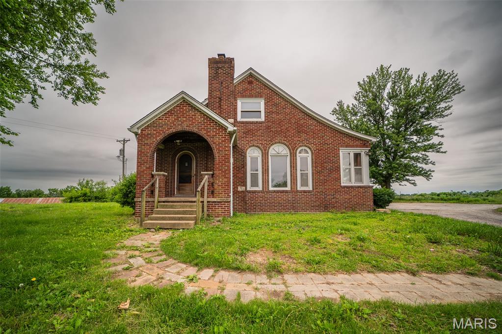 As-is opportunity on 9 scenic acres just under a mile from the Missouri River, offering a rare blend of privacy, space, and potential. This 1.5-story home features 4 bedrooms and 3 baths with solid bones and a functional layout, ready for your vision and cosmetic updates. Ideal for investors, homesteaders, or anyone looking to create a rural retreat, the property includes a massive 40x60 outbuilding with a lean-to—perfect for equipment, workshop space, storage, or livestock use. The acreage provides ample room for animals, gardening, recreation, or future expansion in a peaceful country setting near one of Missouri’s most iconic natural landmarks. With strong structure already in place, this property is brimming with opportunity and waiting to be transformed into something special.