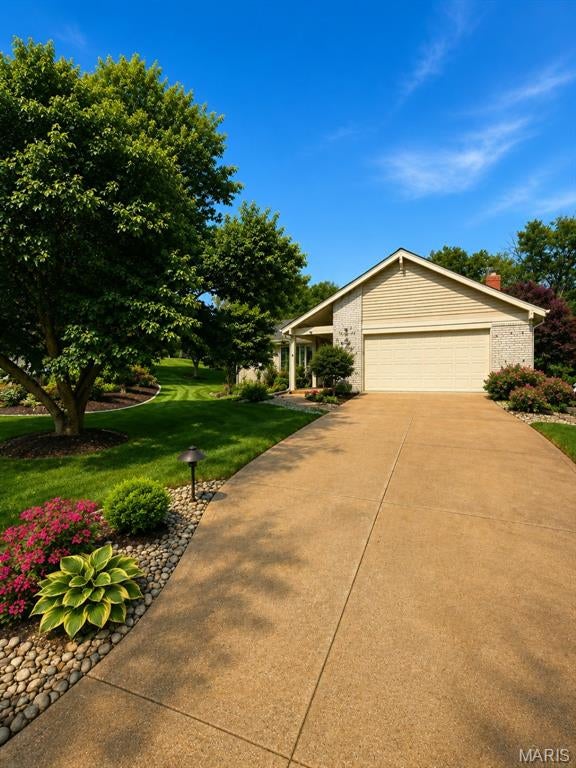 Welcome home to this beautiful 3-bedroom, 2-bathroom Des Peres home in the award-winning Kirkwood School District! Offering 2,352 square feet of living space on a large corner lot, this home combines a desirable location with spacious living areas, great entertaining space, and plenty of potential to make it your own.

From the moment you arrive, the excellent curb appeal and welcoming entry make a great first impression. Inside, you’ll find a bright and spacious main level with an open, flowing floor plan, beautiful flooring, oversized windows, architectural details, and plenty of natural light.

The gourmet kitchen is the heart of the home, featuring premium finishes, abundant cabinetry, and a large center island perfect for meal prep, casual dining, and gathering with family and friends. The kitchen opens directly to the inviting family room with wet bar, creating an ideal setup for both everyday living and entertaining.

The spacious primary bedroom suite offers a peaceful retreat with generous his-and-hers walk-in closets and a spa-inspired en-suite bathroom. Two additional bedrooms provide flexibility for family, guests, a home office, or hobbies.

The unfinished basement offers even more possibilities, including a bonus room that can be used for a home office, workout space, recreation area, guest space, or additional storage. A newly installed French drain system provides added peace of mind while leaving plenty of opportunity for a future buyer to finish and customize the basement while adding value and additional living space.  Outside, enjoy the Patriot sunroom and newer maintenance-free composite deck, creating a fantastic space for morning coffee, summer BBQs, entertaining, or simply relaxing outdoors.  The large 2-car garage provides plenty of room for all the extras that come with everyday life.  Located in highly desirable Des Peres, Missouri, this home is close to parks, recreation, shopping, restaurants, dining, entertainment, and major commuter routes.  If you’ve been searching for a 3-bedroom, 2-bathroom Des Peres home with 2,000+ square feet, a 2-car garage, basement, bonus room, sunroom, composite deck, spacious kitchen, primary suite, and Kirkwood schools, this one deserves a closer look!