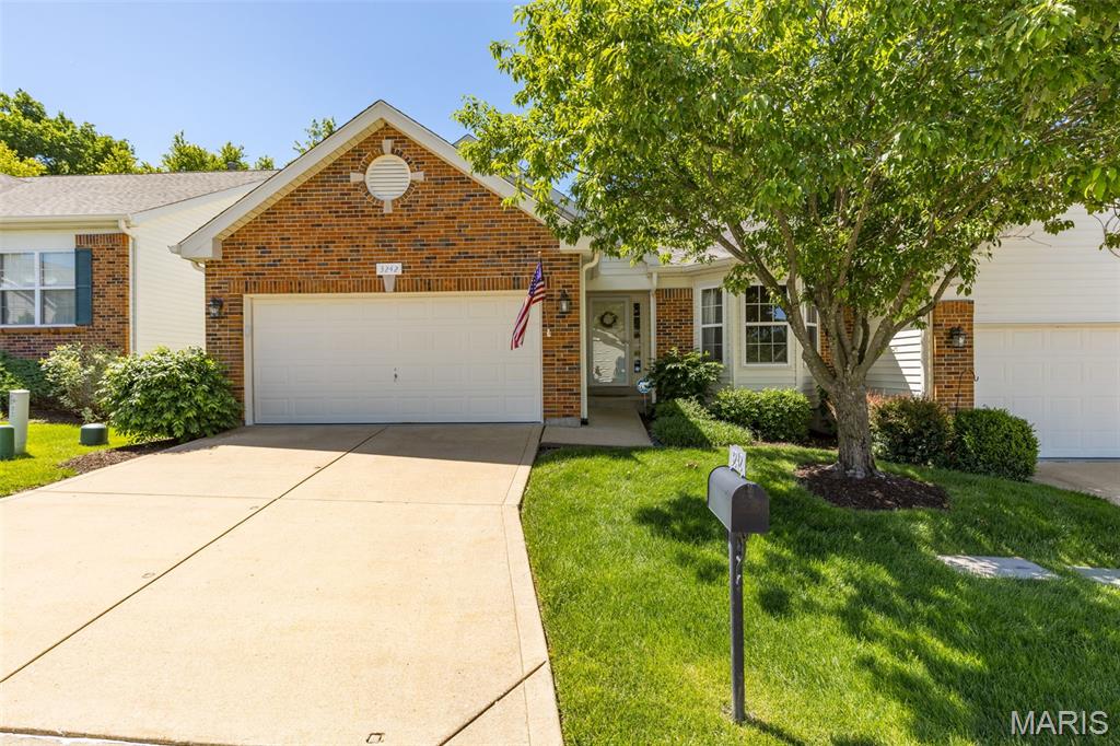 Move-in ready and beautifully updated, this stunning villa offers the perfect blend of comfort, style, and convenience! This villa showcases gorgeous wood floors throughout the main living area, soaring vaulted ceilings, and beautiful finishes throughout. The primary suite offers generous closet space, while the main floor laundry and oversized 2-car garage add everyday convenience. The open floorplan is ideal for everyday living and entertaining alike. Enjoy the bright breakfast nook with access to a gorgeous deck overlooking a peaceful tree-lined rear yard. The finished lower level adds incredible living space with a large recreation/entertaining area, wet bar, full bath, and plenty of room for gatherings, hobbies, or overnight guests. Tucked in a desirable location close to shopping, dining, and major conveniences, this villa is truly one you won't want to miss. Make this one yours!