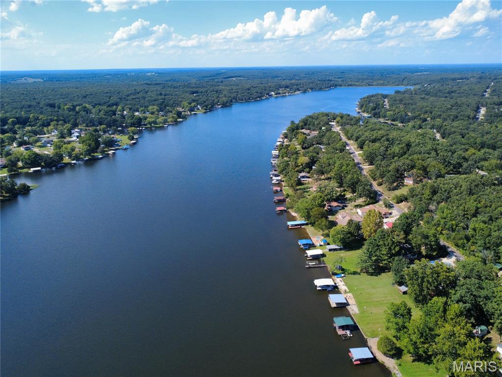 Here’s an incredible opportunity to own your own slice of lake life! Located in the gated Indian Hills Lake community, this .24-acre wooded lot offers endless possibility. Located just minutes from I-44, you can easily escape to your own weekend getaway and enjoy everything lake life has to offer. Indian Hills Lake residents enjoy access to a stocked 326 +/- acre lake, sandy beach, playgrounds, tennis courts, pickleball courts, and so much more. If you’ve been dreaming of building a lake house, creating a weekend retreat, or simply investing in a place to make memories, this lot is just a short walk to the boat slip at Cove 9 and the amenities that make this community so special. Spend your weekends fishing, boating, relaxing, and enjoying the beautiful views all around. With a full-service marina, golf cart maintenance, road maintenance and a general store stocked with your lake essentials, everything you need to enjoy your time at the lake is right here. Priced to sell, don’t miss this opportunity to own your own slice of paradise and start making memories for years to come! Schedule your private showing of this beautiful community today! For more information, visit ILPOA.org