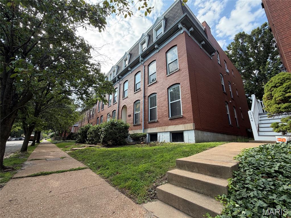 Welcome to 2336 Rutger in historic Lafayette Square - just steps from the Lafayette park and ideally located for easy access to restaurants, shops, and outdoor adventures. This beautifully maintained ground-floor unit offers hardwood floors and an inviting open-concept living, dining, and kitchen area. The home also features a convenient in-unit laundry room. The spacious primary suite is a true retreat, featuring generous closet space, direct access to a private patio, and an updated bathroom with a double vanity. There is plenty of room for a king-size bed and extra furnishings. An updated half bath adds further convenience. The lovely second bedroom is ideal for guests, a home office, or flexible living space. Additional features include a reserved off-street parking space in the rear, conveniently located within view of the secluded patio, and a one-step entry into the comfortable, single-level home. A private storage locker is available in the lower level. New HVAC! Enjoy low-maintenance, elevated living in a vibrant and historic community—where convenience, comfort, and style come together.