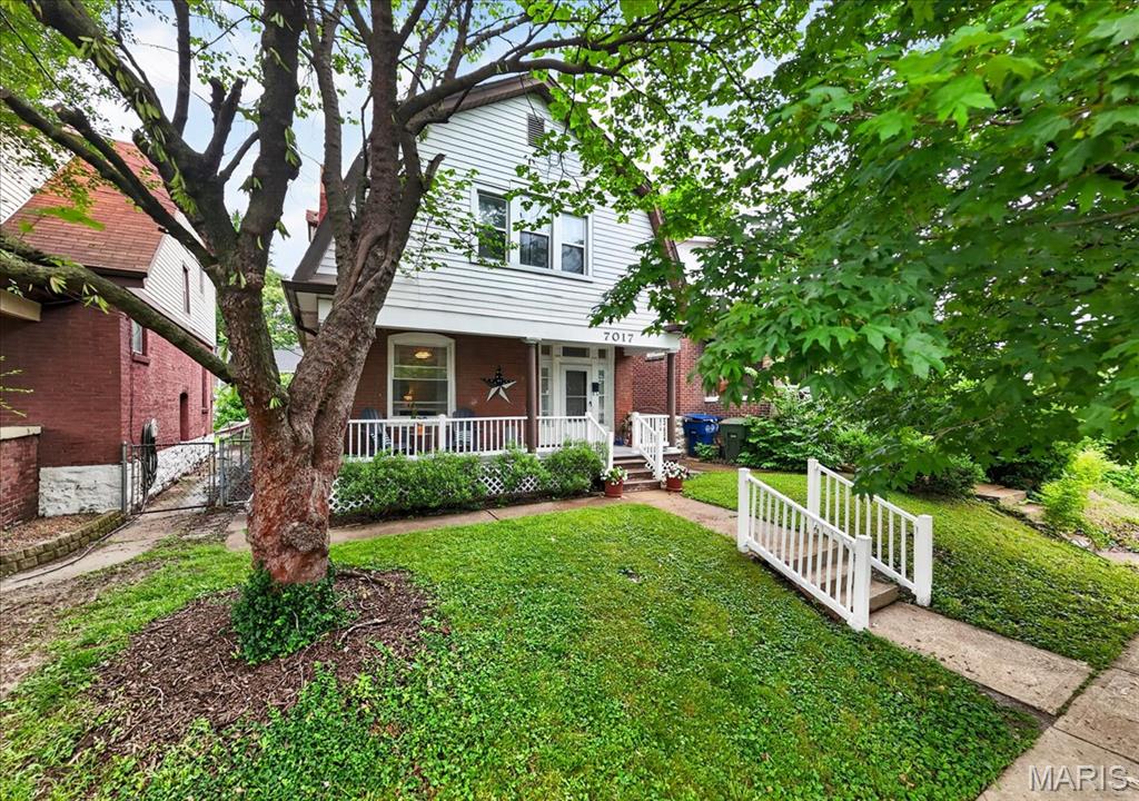Open House Friday 5/29 4-6pm * Tucked into one of St. Louis' most beloved neighborhoods, this charming home blends the warmth of a historic home with the ease of modern living. From the moment you arrive, the lush landscaping and covered front porch invite you. Inside hardwood floors and original trim details flow through the spacious living and dining rooms, while a classic pocket door adds a touch of timeless elegance. The updated kitchen features white shaker cabinets, granite countertops & new stainless appliances. A convenient half bath completes the main level. Upstairs, you’ll find a spacious primary bedroom, two additional bedrooms, an updated full bath, and convenient second-floor laundry. Out back the large fully fenced backyard offers a new patio, perfect for entertaining, and a new shed. A new roof (2021) and new HVAC (2025) offer added peace of mind. Steps from neighborhood favorites, parks, and some of the best dining St. Louis has to offer, this home puts you exactly where you want to be.