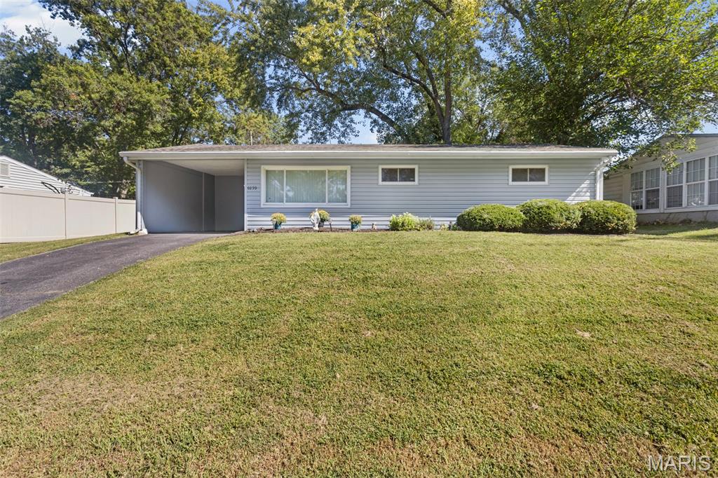 Welcome to 9259 Bataan. Please feel free to look over all of the details of this freshly revamped home. New LVP floors in the kitchen, dining area and large living room. The living room has lots of natural light and accented with freshly painted walls. New carpet and fresh paint throughout the house and including the kitchen cabinets! The kitchen has plenty of storage and a clean look. 2 Good sized bedrooms with ample closet space in each. 

The yard was again freshly updated to make for simple and easy maintenance, both front and back. The back patio boasts a large oak to provide shade to the home and patio. Storage shed in the back yard to store all your yard tools. 

Across the street from the city hall and great access to the airport, highway 70 and 170.