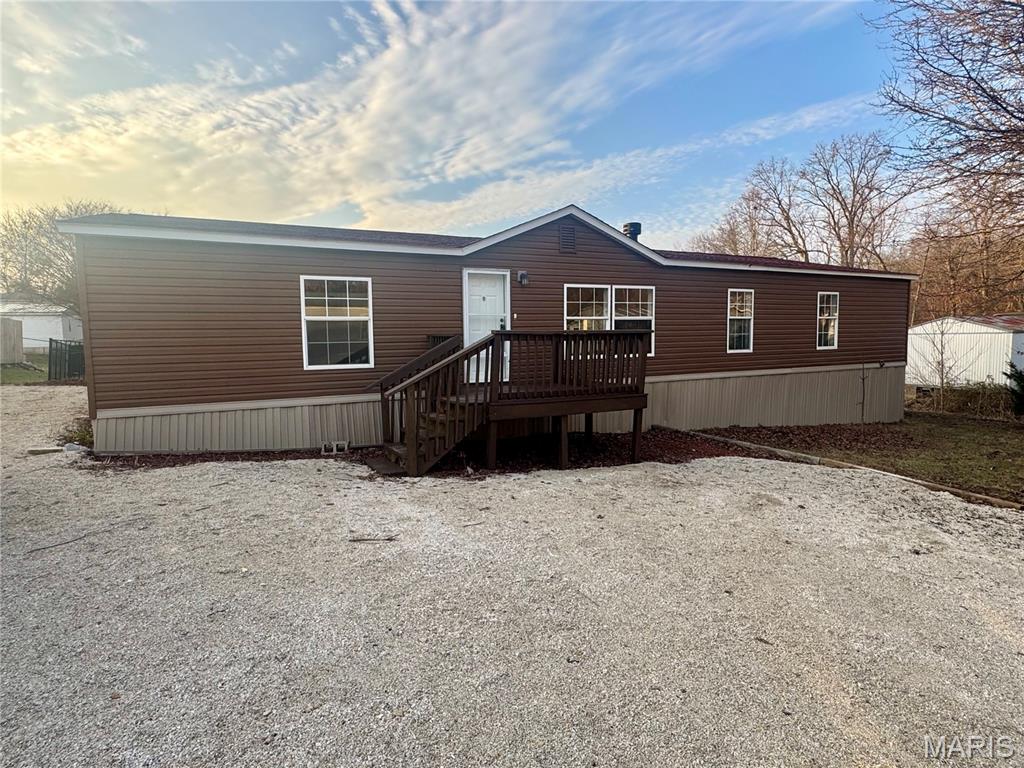 BACK ON MARKET NO FAULT OF SELLER!! This 1680 square foot mobile home in Troy offers a spacious & functional layout. The home features 3 bedrooms & 2 full bathrooms, along with a large living room highlighted by a wood-burning fireplace. Recent updates include new flooring, fresh paint, & updated finishes throughout, making this property truly move-in ready. Enjoy a nice backyard & added peace of mind with a new electric furnace and new water heater. A great opportunity for comfortable, affordable living in a convenient Troy location.