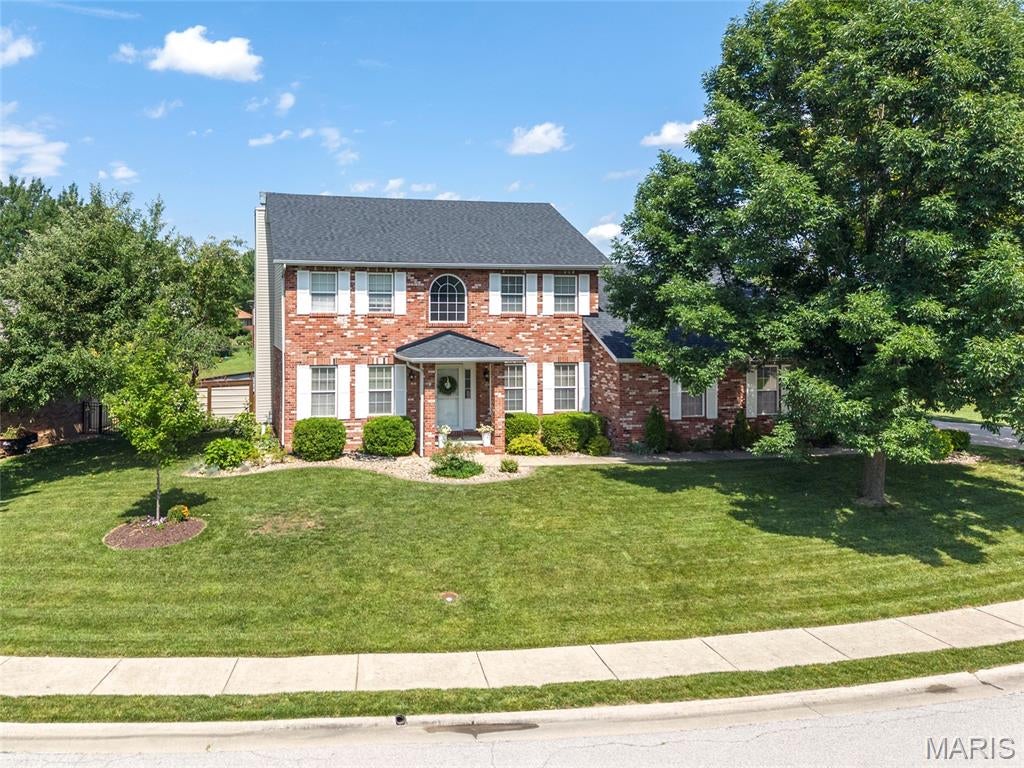 Welcome to 131 Saint Sabre, where classic curb appeal meets stylish updates and an abundance of living space! This beautifully maintained two-story home welcomes you with a stunning full brick front facade, mature landscaping and an inviting interior filled with natural light. The main level offers multiple living spaces, including a spacious family room centered around a brick fireplace, a separate living room and a formal dining room with tray ceiling—providing plenty of room for both everyday living and entertaining.

The updated kitchen is bright and functional with solid-surface countertops, stainless steel appliances, tile backsplash, center island and an adjoining breakfast area surrounded by windows. Just off the kitchen, French doors provide convenient access to the covered back porch and large fenced yard. A stylishly updated half bath & laundry room complete the main level.

Upstairs, the generous primary suite features a tray ceiling, plenty of room for a king-size bed and a spacious private bath with dual vanities, separate shower and jetted corner tub. Additional bedrooms offer great space and flexibility, while the updated hall bath adds a fresh, modern touch.

The finished lower level expands the home's possibilities with a large recreation/family room featuring beautiful coffered ceiling detail, exposed wood accents, a second brick fireplace and plenty of space for entertaining, a home gym or media area. An additional finished room and full bath make this level ideal for guests, a home office or additional living space.

Throughout the home, neutral finishes and low maintenance flooring create a cohesive feel, while thoughtful updates to lighting, baths and living spaces add personality and style. Situated on a beautifully maintained corner lot with mature trees and an expansive lawn, this home is just minutes from Highway 64 for quick city or SAFB commutes!