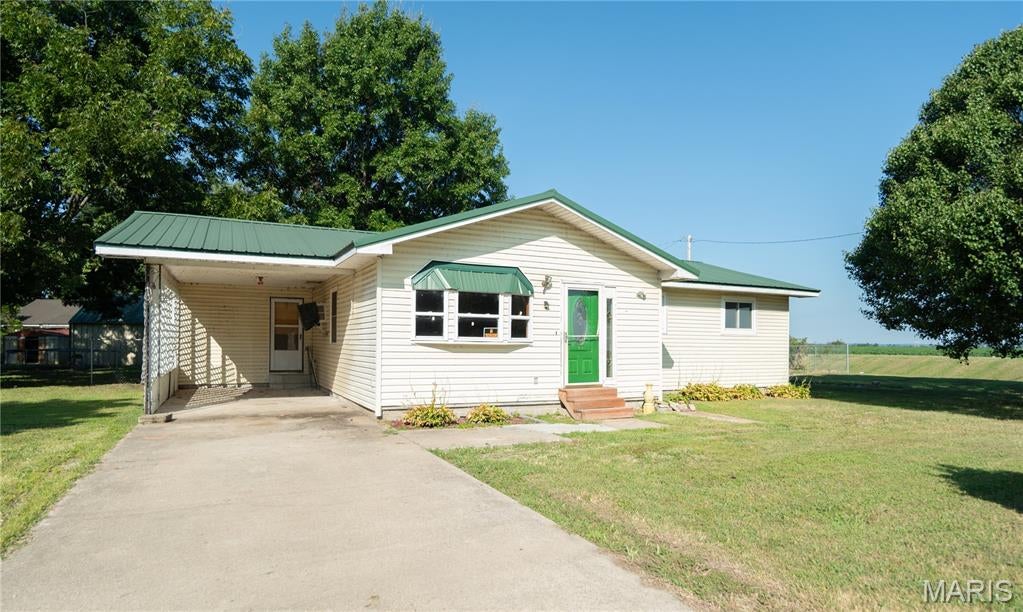 Welcome home to this charming and affordable 3-bedroom, 1.5-bath home nestled on a beautiful corner lot. The fenced backyard provides a great space for children, pets, family gatherings, or simply relaxing outdoors, while the detached garage offers added storage and convenience. With a little TLC, this home has the potential to become the perfect place to create lasting memories. Don't miss this wonderful opportunity to make it your own!