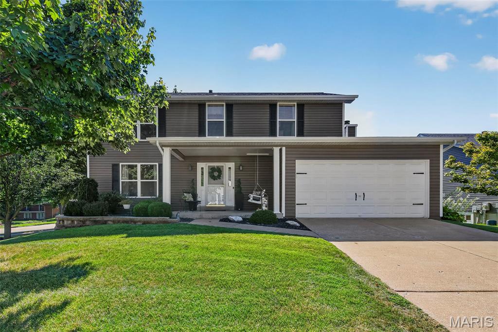 Welcome to this beautifully maintained and thoughtfully updated home, conveniently located in the heart of St. Charles and situated on a desirable corner lot backing to common ground. The main level features an open floor plan with a half bath, wood-burning fireplace and luxury vinyl plank flooring. The updated kitchen showcases custom soft-close cabinetry, granite countertops, and a center island—perfect for meal prep, casual dining and entertaining. The updated oversized primary bath adds another welcome touch of modern appeal. Upstairs, the fourth bedroom shown in the tax records has been converted to a convenient upper-level laundry room—a practical feature that keeps laundry close to the bedrooms!
The walk-out lower level offers partially finished space with plenty of possibilities for a recreation room, home office, workout area, hobby space or additional entertaining. Major exterior improvements are already done, including a newer roof, siding and gutters, providing peace of mind for years to come. Outside, the composite deck and fire pit create the perfect setting for relaxing, entertaining and enjoying the privacy of backing to common ground.  You’ll also appreciate the home’s convenient location with easy access to shopping, dining, hospitals, major highways and everyday conveniences. With its thoughtful updates, flexible living spaces, desirable outdoor setting and significant recent improvements, this Windsor Estates home offers the opportunity to move in and enjoy without taking on a long list of major projects.