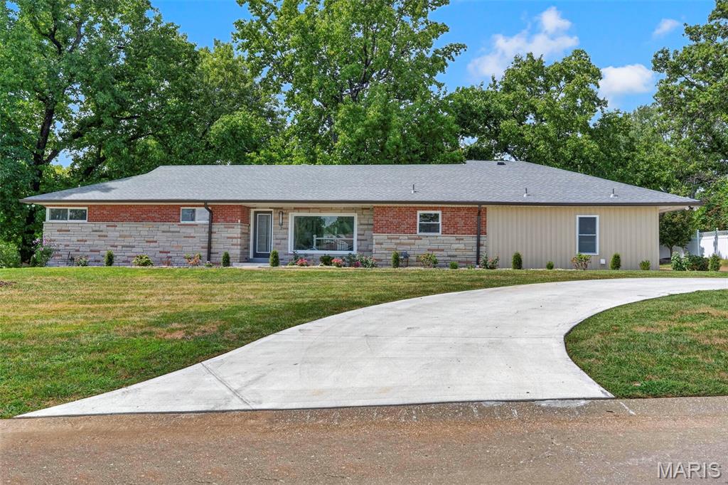 Welcome to 2 Dorclin Lane, located in the award-winning Lindbergh School District! This beautifully updated 4-bedroom, 3.5-bath home is filled with natural light from its oversized windows and offers an inviting open floor plan perfect for everyday living and entertaining.

The updated kitchen features a gas range, smart refrigerator, brand-new stainless-steel appliances, beautiful backsplash, quartz countertops, and plenty of space to gather. Enjoy the convenience of main-floor laundry, along with all-new bathrooms showcasing new cabinetry and quartz countertops. Fresh paint and luxury vinyl plank flooring throughout give the entire home a clean, modern feel.

Retreat to the owner’s suite featuring a walk-in closet with custom closet organization and an updated bath with a smart toilet. The walkout lower level offers a large entertaining area with a bar and mini fridge, ample storage, and easy access to the beautiful backyard. With a brand-new driveway and thoughtful updates throughout, this is one you won’t want to miss!