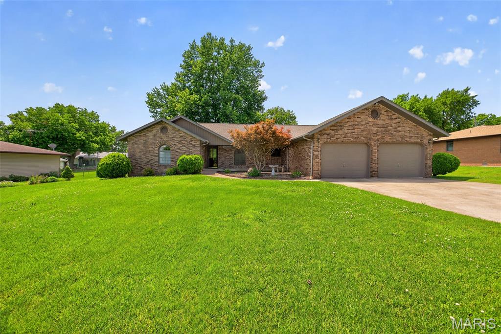 Look at this beautifully well maintained all brick home featuring 3 bedrooms, a dedicated office, 2 full bathrooms, 1 half bath, and 2,111 square feet of comfortable living space, all in a quiet neighborhood. Situated across from an empty lot, you’ll enjoy a peaceful setting on the covered front porch. There’s added privacy in your fully fenced backyard which also features a nice covered back deck with fan and newer patio furniture that stay! Entertain rain or shine, and have fun in the large backyard where there is a storage shed ready for your outdoor items. Inside this lovely home is a split bedroom floor plan, huge primary suite, large kitchen with island, tons of cabinet space, breakfast bar, and dining area. There’s so much character throughout and even a cozy fireplace. This move in ready home has seen numerous recent improvements over the last year including the privacy fence, covered back deck, landscaping enhancements, decorative columns at the end of the driveway, new dishwasher, and a new electric cooktop. Plus the interior was professionally painted and carpets professionally cleaned! Don’t miss out on this great place that has so many amazing features!