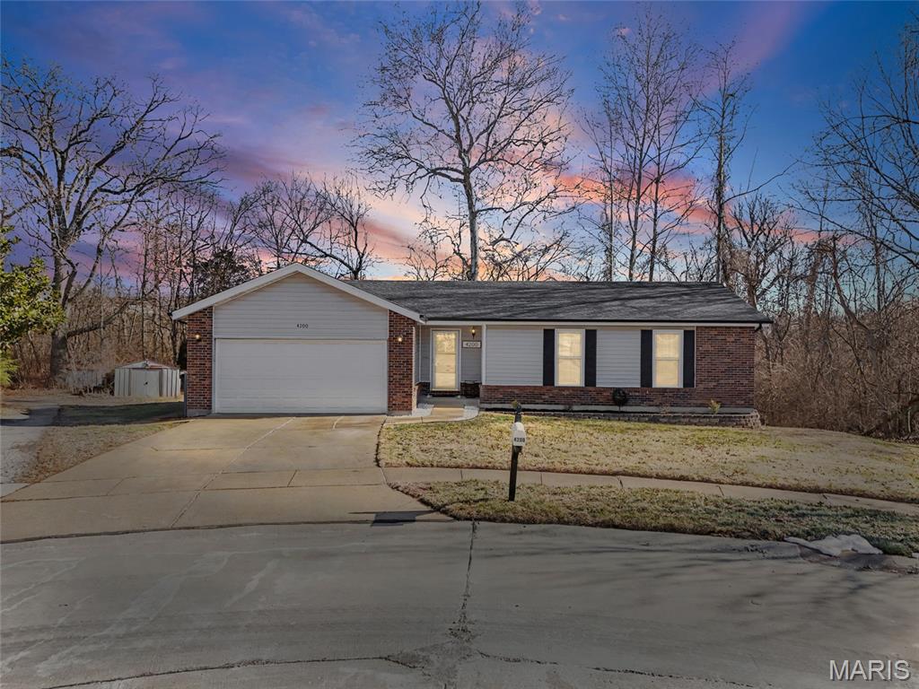 Welcome home to this beautifully updated ranch offering the perfect blend of style, comfort, and privacy! Nestled on a picturesque lot backing to mature trees, this move-in ready home features an inviting open floor plan with gleaming hardwood floors, a stunning floor to ceiling brick fireplace flanked by custom built-ins, and abundant natural light throughout. The renovated kitchen is sure to impress with white shaker cabinetry, granite countertops, subway tile backsplash, stainless steel appliances, and ample dining space. The spacious primary suite offers a designer accent wall and an updated bath with custom tile shower and modern finishes. The finished lower level provides an incredible extension of living space complete with a large family room, stylish wet bar, and beautifully updated full bath, perfect for entertaining or relaxing. Step outside to enjoy the expansive new deck overlooking the private backyard, creating the ideal setting for morning coffee or evening gatherings. Additional features include an attached two-car garage, updated finishes throughout, and a fantastic location close to shopping, dining, parks, and major highways. This one truly checks all the boxes!