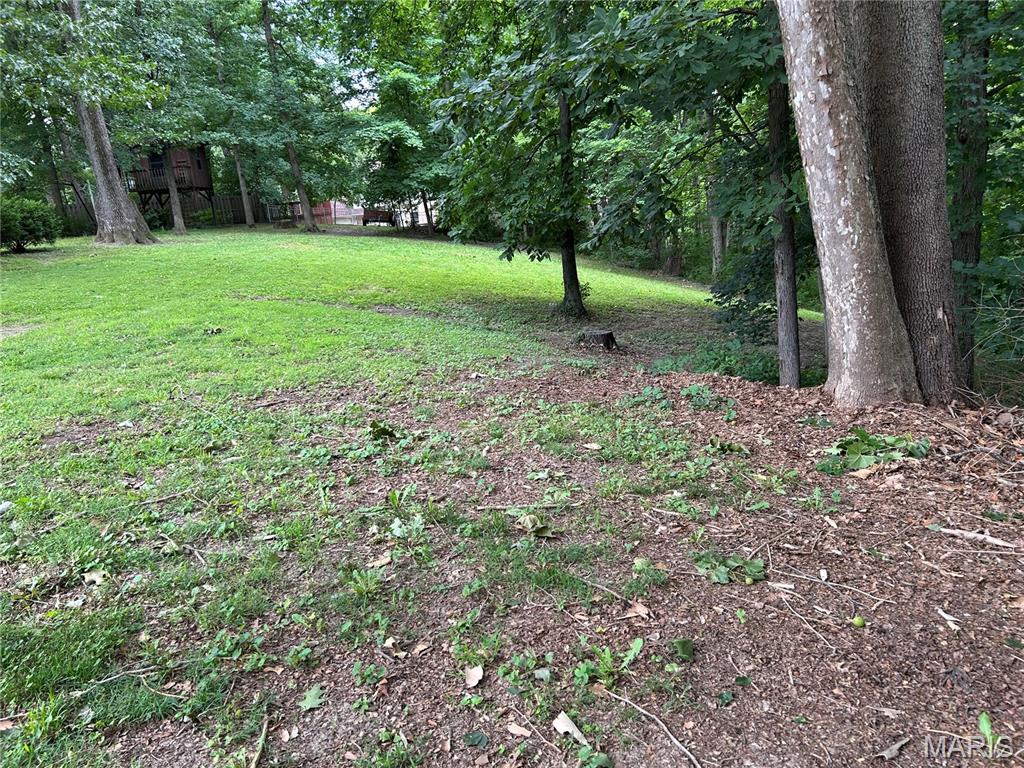 Build your dream home in the heart of O'Fallon! This beautiful wooded lot offers a rare opportunity to build in an established neighborhood close to shopping, dining, schools and other local amenities. Situated at the end of a quiet cul-de-sac, the property provides a peaceful setting with excellent potential for a walkout basement design.  With no HOA restrictions, you have the freedom to bring your own builder and customize your home to fit your lifestyle. A house plan is available upon request. Don't miss this chance to create your perfect home in one of O'Fallon's most desirable locations.