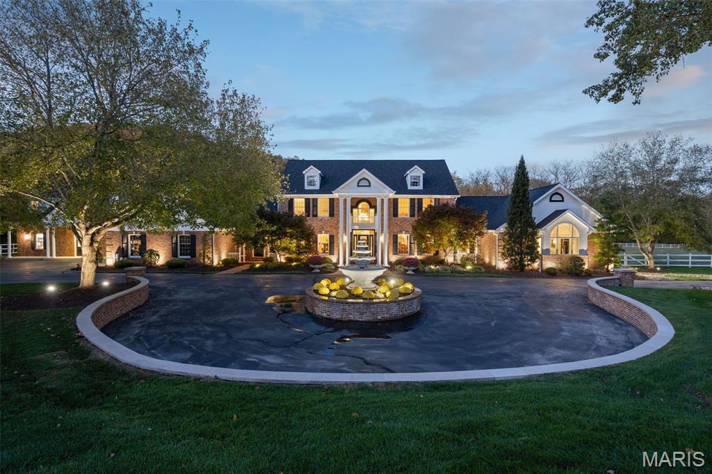 Spanning 8.24 acres, this stunning resort-style property epitomizes the ultimate in vacation living, beautifully framed by the picturesque scenery of Rockwood Reservation. The estate has undergone extensive renovations, culminating in a recently updated basement in 2024 that enhances the inviting and modern atmosphere throughout. This tranquil oasis features a spacious main estate home alongside a separate guest house, providing ample room for family and friends.

At the heart of the property lies an inground Pebble Tec heated pool, complete with a graceful waterfall and a cool deck perfect for relaxation. For sports enthusiasts, a lighted sports court—renovated in 2025—serves as an ideal venue for active pursuits. A serene pond, adorned with a fountain and a charming spring house, adds to the natural beauty of the surroundings.

The expansive outdoor living space is designed for entertaining, featuring a covered gourmet kitchen and a wraparound Trex deck, completed in 2024, that sets the stage for gatherings under the sun. The estate offers 5 bedrooms and 8 baths, encompassing a generous 9,211 square feet of finished living space. The 1.5-story residence boasts large, airy rooms, highlighted by a glass sunroom that overlooks the pool and the beautifully landscaped grounds.

Two master suites with luxurious ensuite spa baths provide private retreats, while two well-equipped laundry areas add practicality to daily life. An exquisite theater and a bourbon/cigar lounge create an exceptional environment for relaxation and entertainment. Additionally, the property features two new wells installed in 2020, replaced HVAC systems, and a new roof as of 2024, ensuring year-round comfort. This estate is a true sanctuary, seamlessly blending luxury and comfort in a breathtaking setting.
