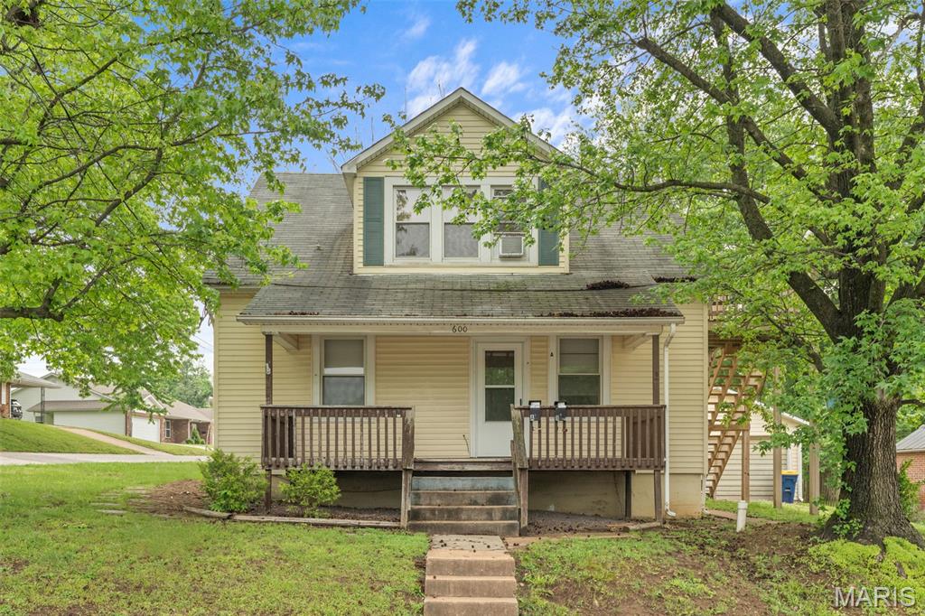 You'll want to take a look at this one.  Situated on a corner lot, this 2-story was previously used as a two-family with side-step entrance to the upper level.  With 2055 sq ft of space, there's plenty of room for everyone!  Two-car detached garage, nice level lot.