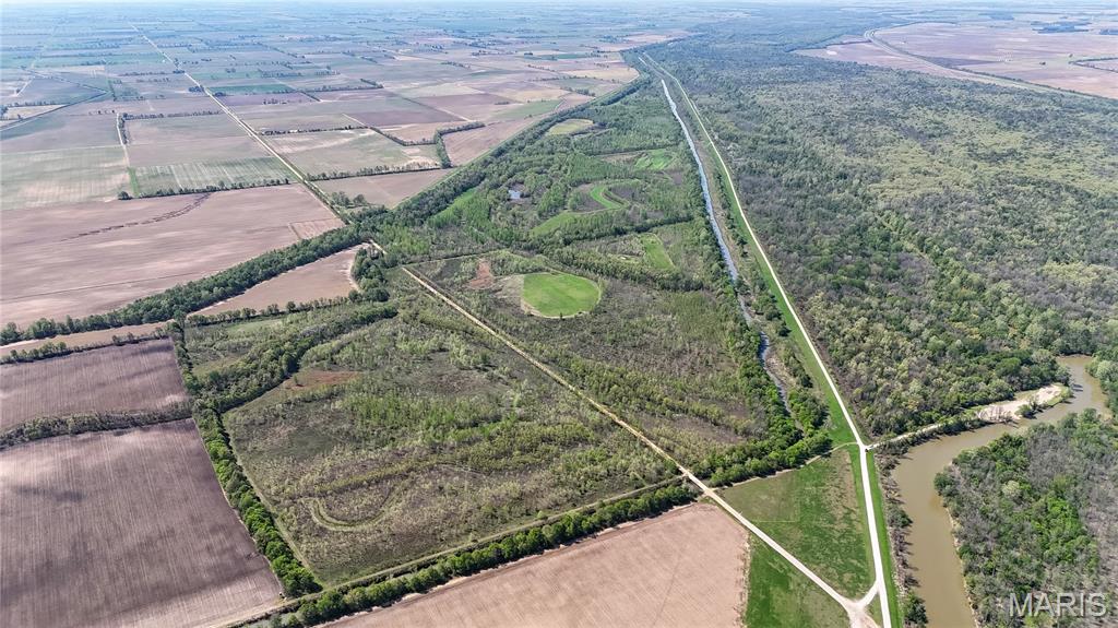 Premier Waterfowl & Whitetail Hunting Property – Saint Francis River – Missouri State Line

This is a rare opportunity to own a true turn-key hunting property in the heart of one of Southeast Missouri’s most sought-after flyways. Spanning 380 acres along the Saint Francis River near Senath, this tract offers everything a serious outdoorsman is looking for.

Bordering the Ben Cash Conservation Area and connected directly to government ground, this property provides exceptional access to thousands of additional acres of prime habitat—enhancing both waterfowl and deer hunting potential.

The farm is enrolled in WRP, creating ideal conditions for holding and attracting ducks. With multiple habitat types including flooded timber and moist soil, established water control, and a proven history of strong duck hunting, this property is ready to perform from day one. A reliable 8” well powered by a John Deere 4D80 power unit ensures consistent water management to keep birds where you want them.

Additional improvements include two Redneck blinds and multiple Millennium tripods strategically placed for deer hunting. The property boasts several well-managed food plots that have produced quality deer, making this a true dual-threat hunting farm.

Farms of this caliber don’t hit the market often, call today to set up a private showing!