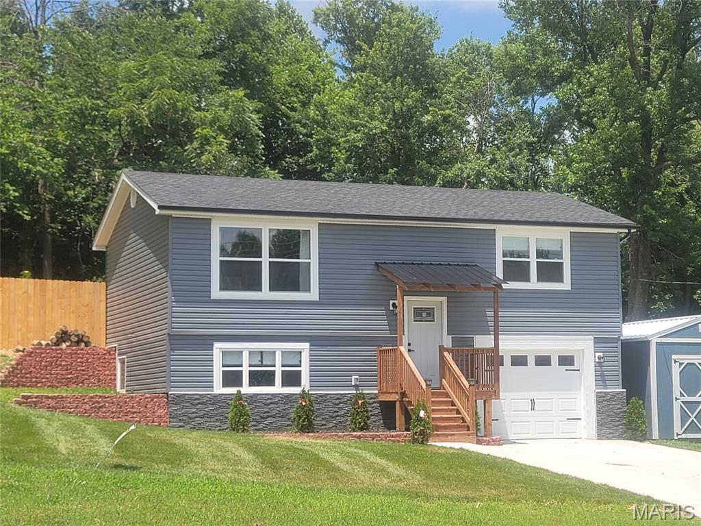 AMAZING NEW LANDSCAPE, FENCING, RETAINING WALL, SPACIOUS LARGE LOT WITH PLENTY OF ROOM. NEW CONSTRUCTION, NEW BUILD. 3 BEDROOM, 2 FULL BATH, NEWLY BUILT CUSTOM STORAGE SHED.