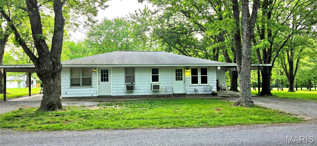 Looking to add to your investment portfolio? Perhaps you want to get started on becoming a landlord? Very well maintained duplex.  In total, there are (4) duplex units and (1) triplex available at very reasonable cost and you can buy one or all. Seller is adding an extra lot to each which would give you (3) or (4) lots. This one includes lots 859, 860, 861, 862 and owner may include some of the lots between 6929 and 6997 Apple Lane in the sale as well. These units stay rented month to month continually. If one tenant moves out, there is a long list of potentials to call on. Most of the tenants are long-term. The owner has improved and updated this entire complex and it looks like a park. Not far from the Spillway and on the Shawnee Wine Trail. In the Carterville School district. Qualified buyers can have a tour of the unit with a bank letter or preapproval. Call for information today.